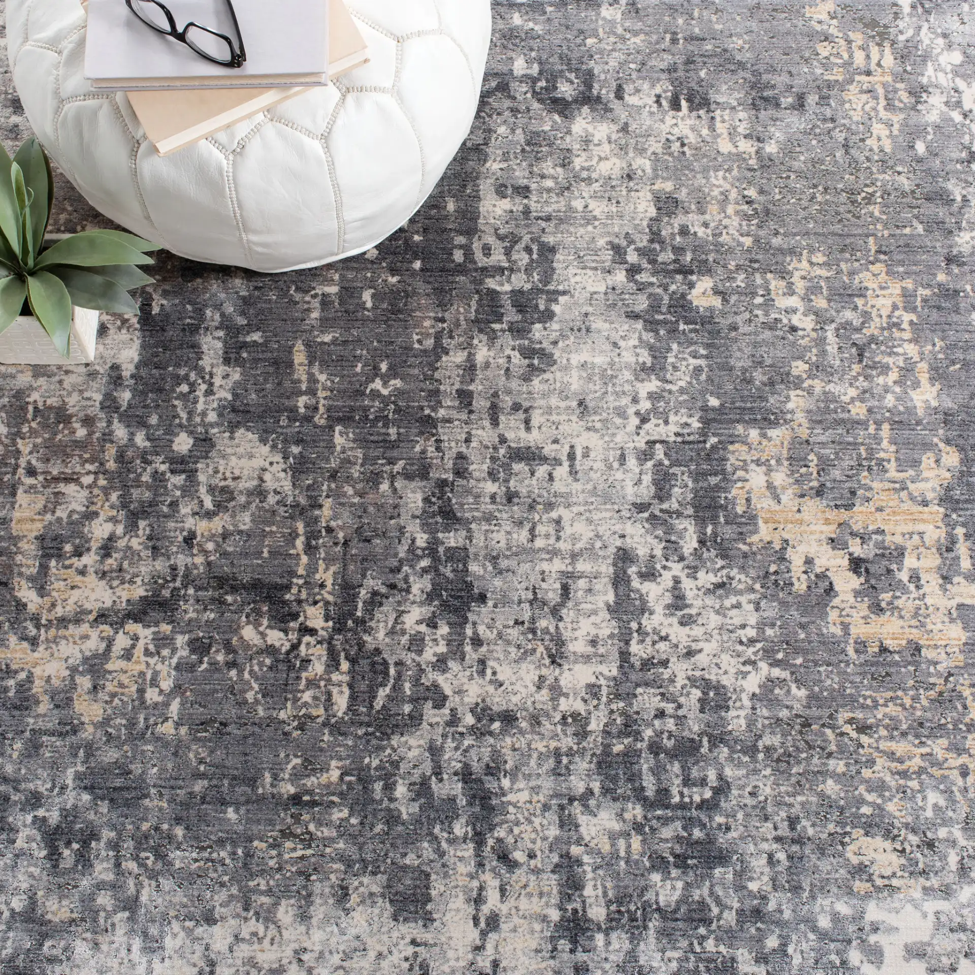 Eclipse Distressed Abstract Rug in Gray / Beige in a styled room