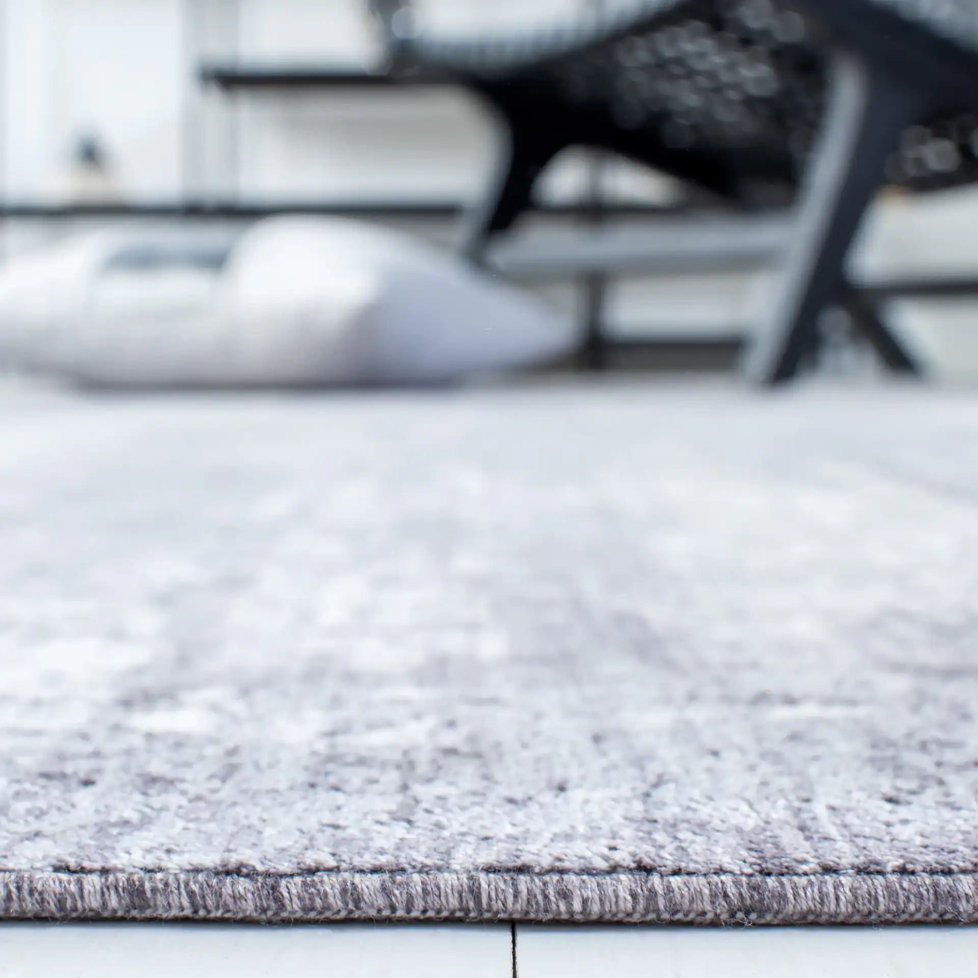Eclipse Abstract Blocks Rug in Charcoal / Gray in a styled room