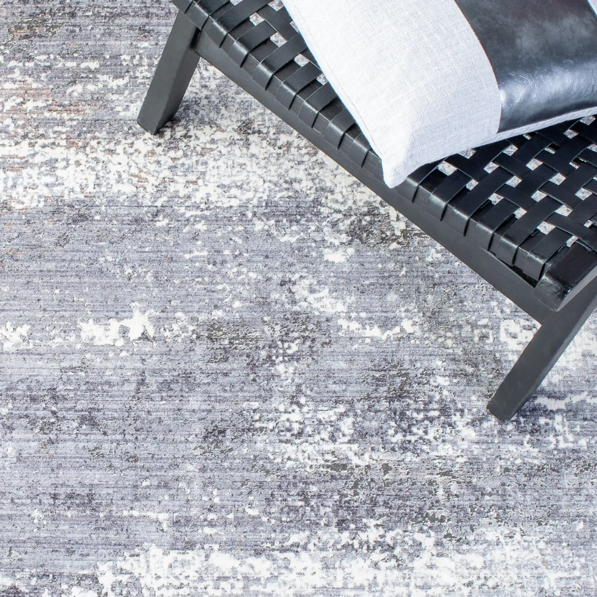 Eclipse Abstract Blocks Rug in Charcoal / Gray in a styled room