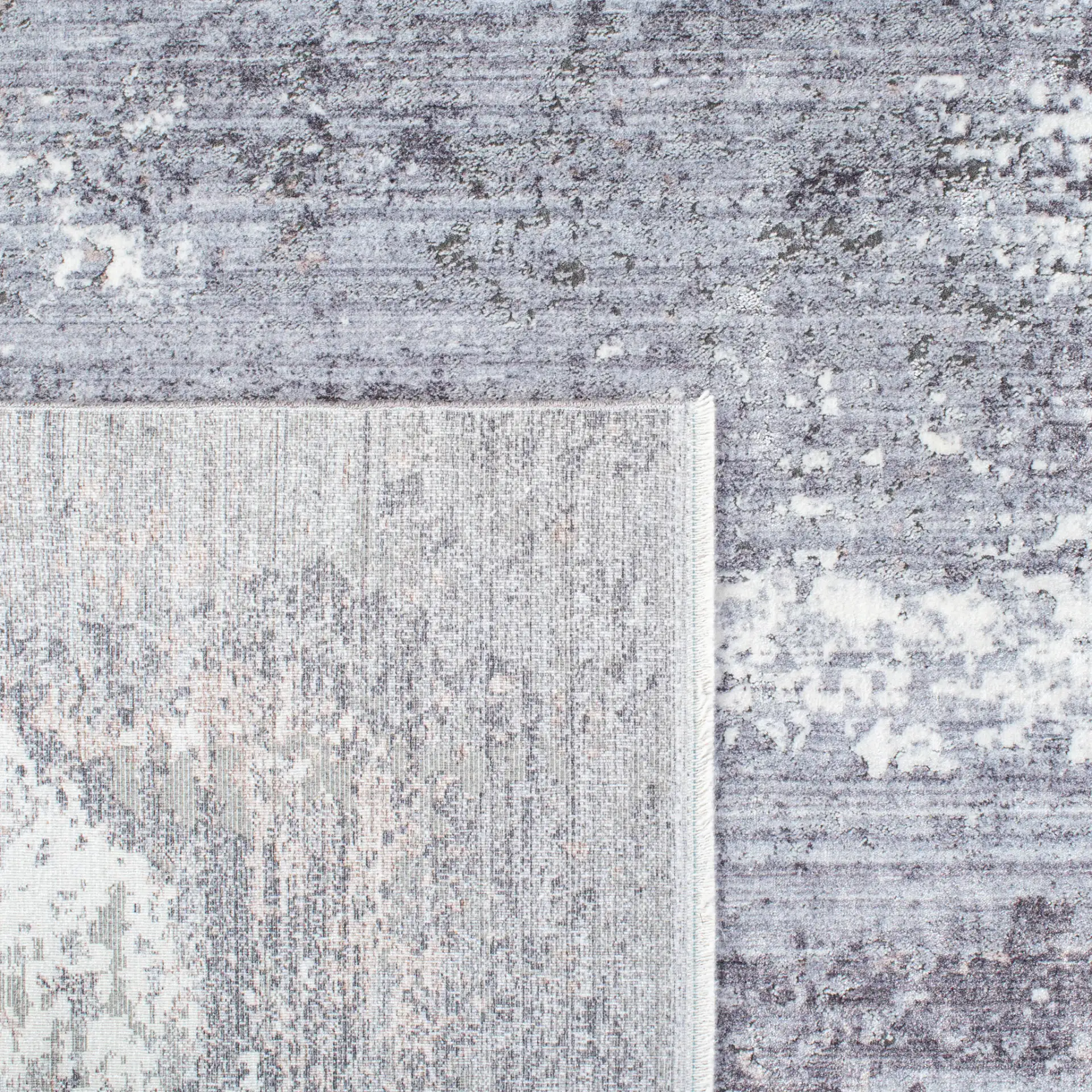 Eclipse Abstract Blocks Rug in Charcoal / Gray in a styled room
