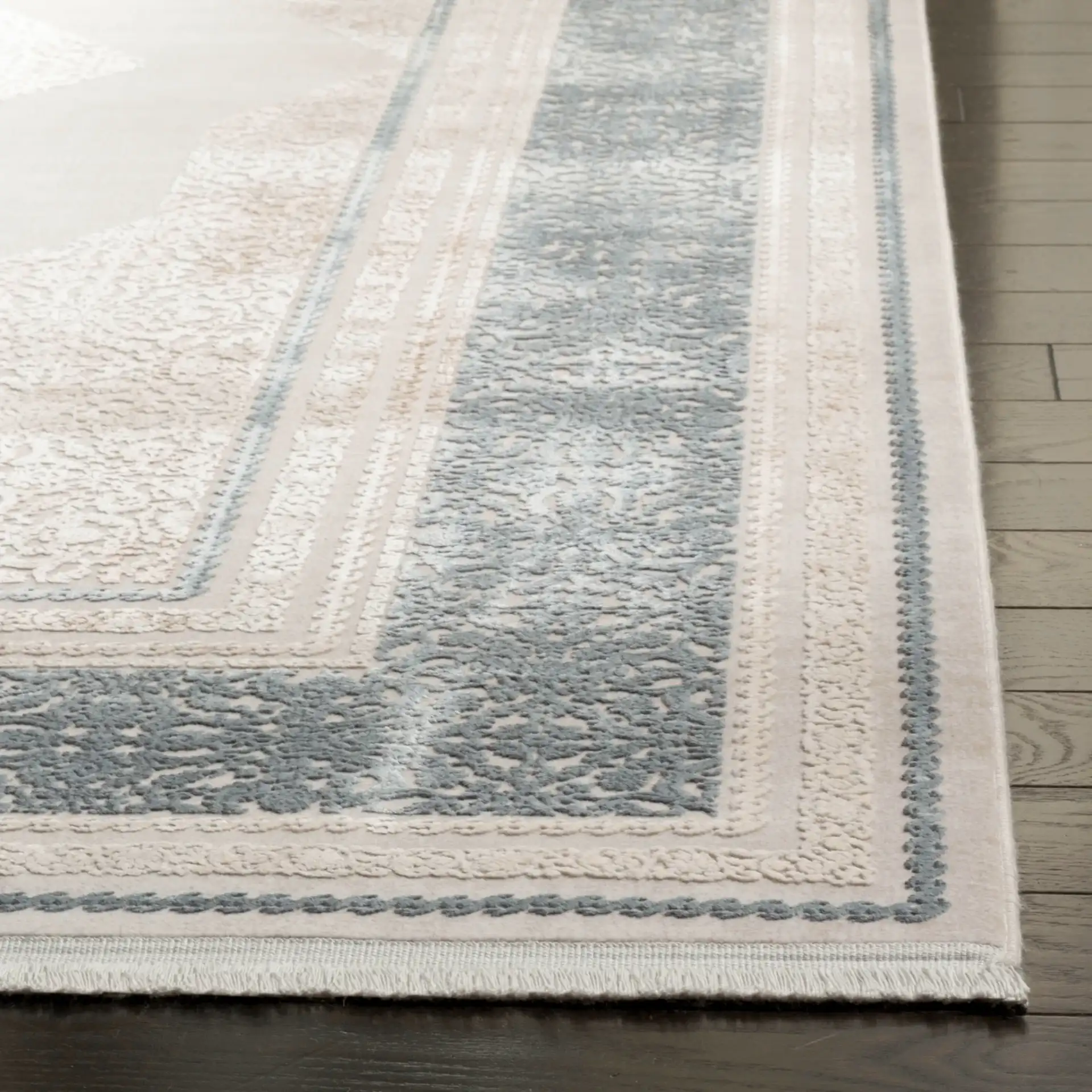 Eclipse Diamond Medallion Rug in Beige / Gray in a styled room