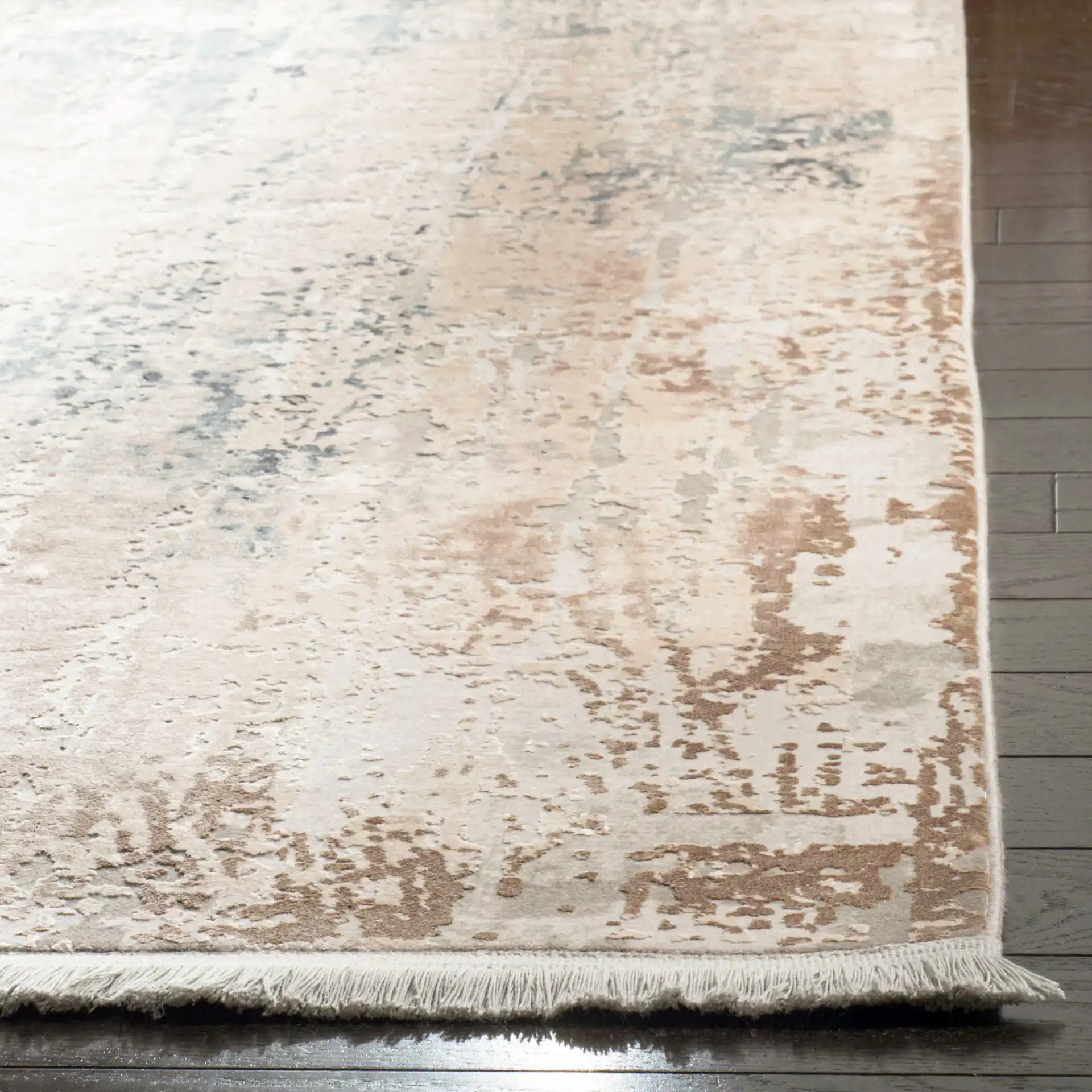 Eclipse Dappled Abstract Rug in Beige / Gray in a styled room