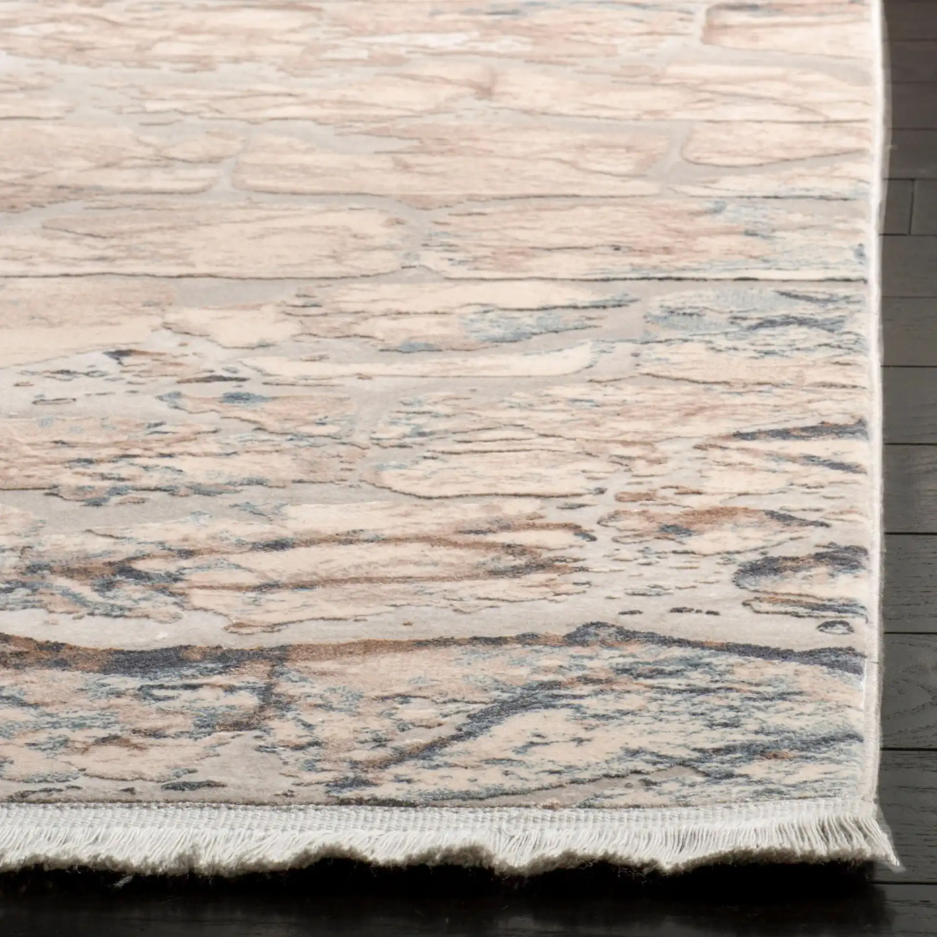 Eclipse Stone Wall Rug in Beige / Light Gray in a styled room