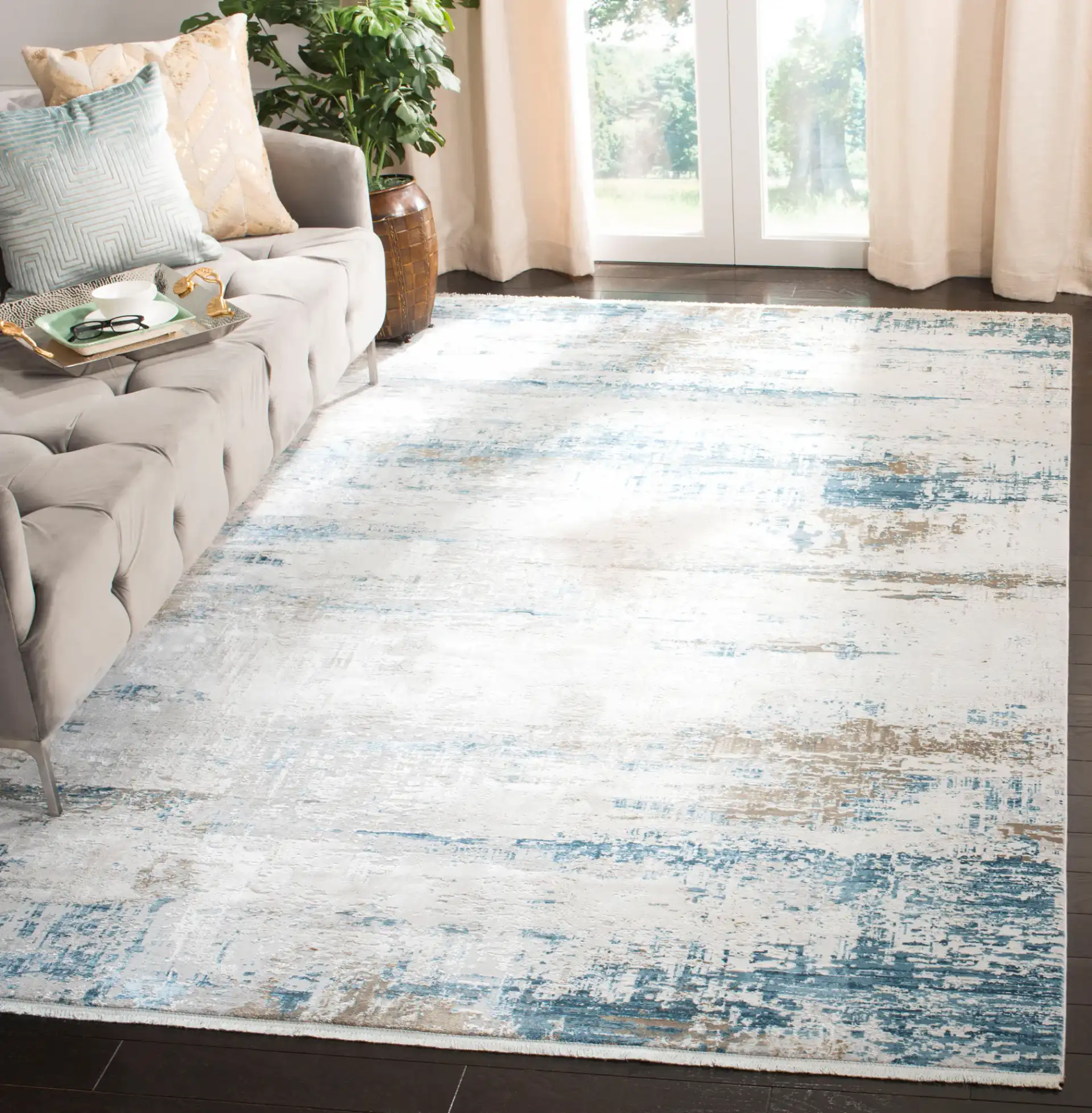 Eclipse Abstract Banded Rug in Beige / Blue in a styled room
