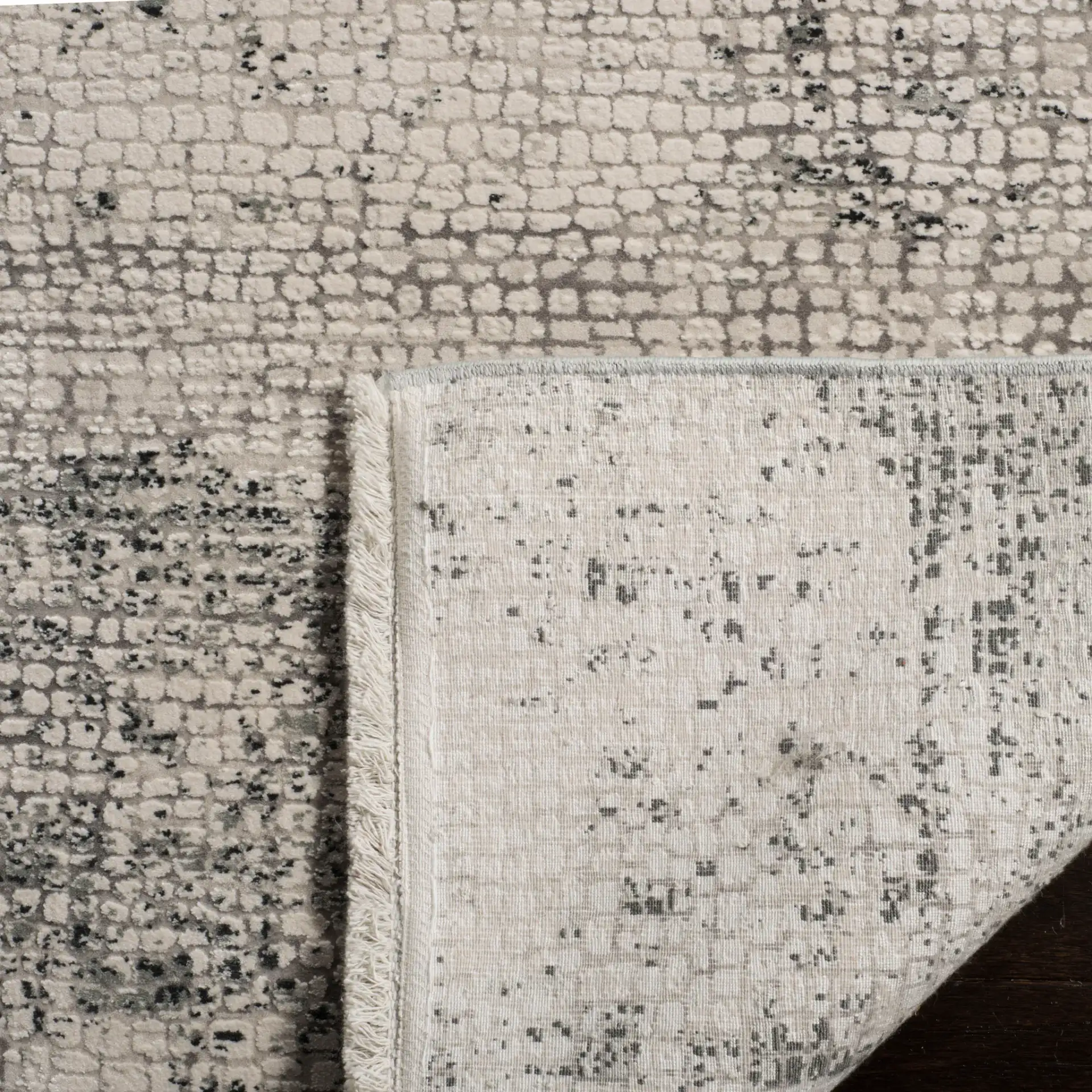 Eclipse Horizontal Abstract Rug in Beige / Gray in a styled room