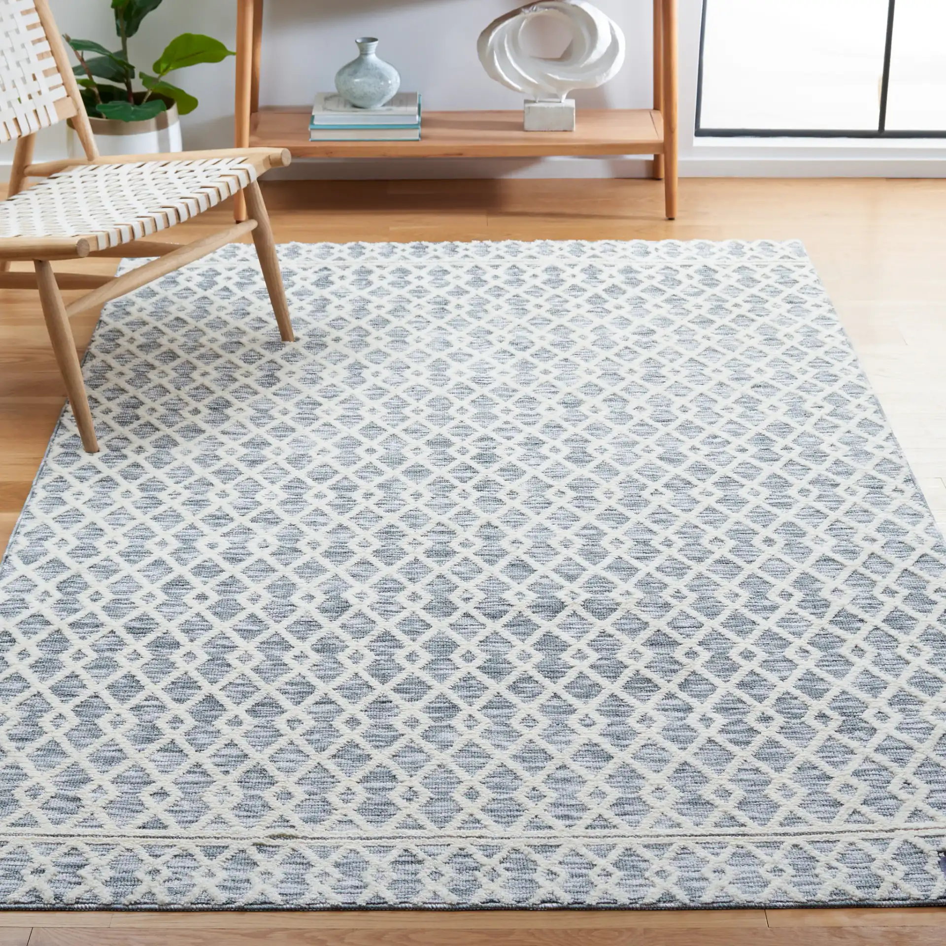 Easy Care Diamond Lattice Washable Rug in Gray / Ivory in a styled room
