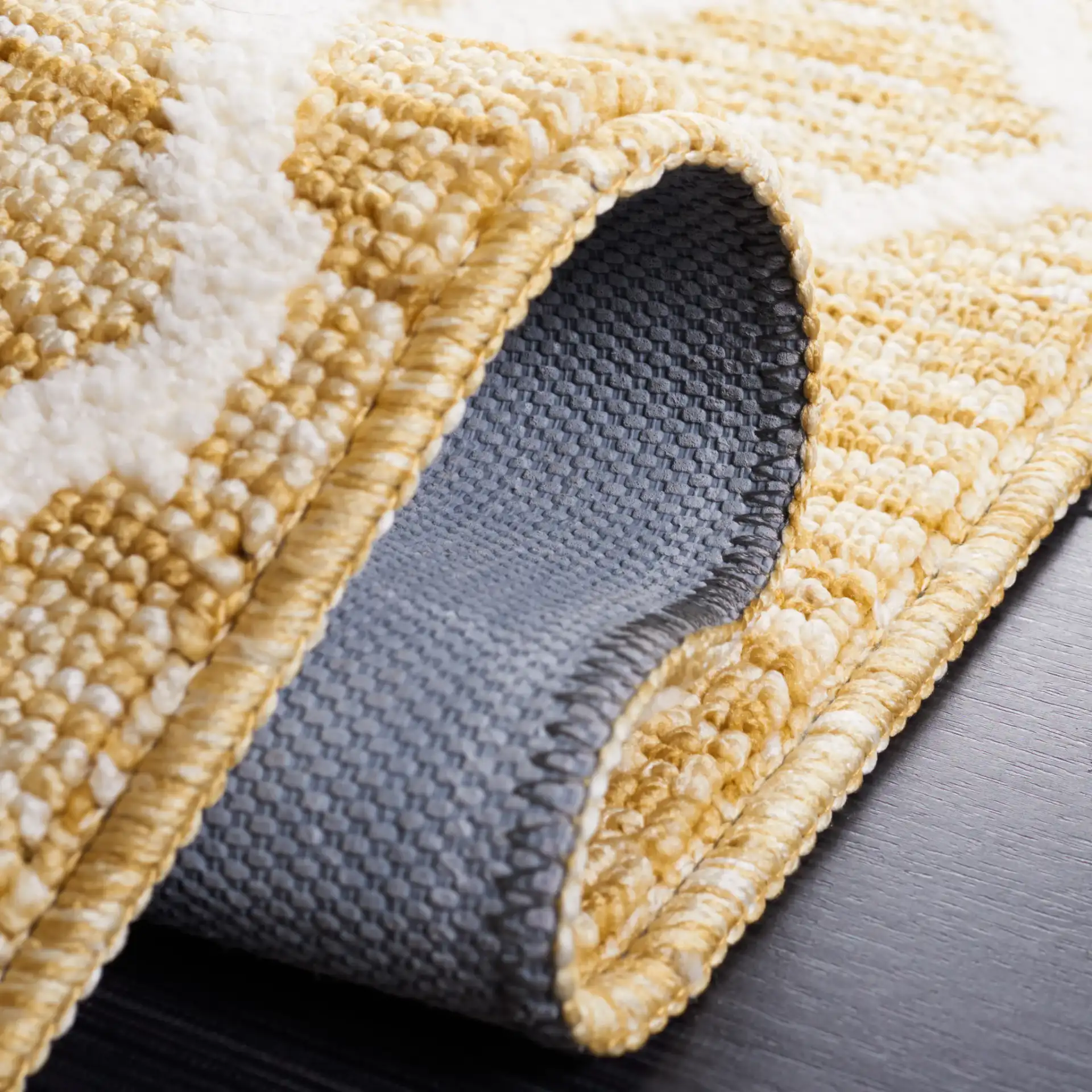 Easy Care Allover Trellis Washable Rug in Gold / Ivory in a styled room