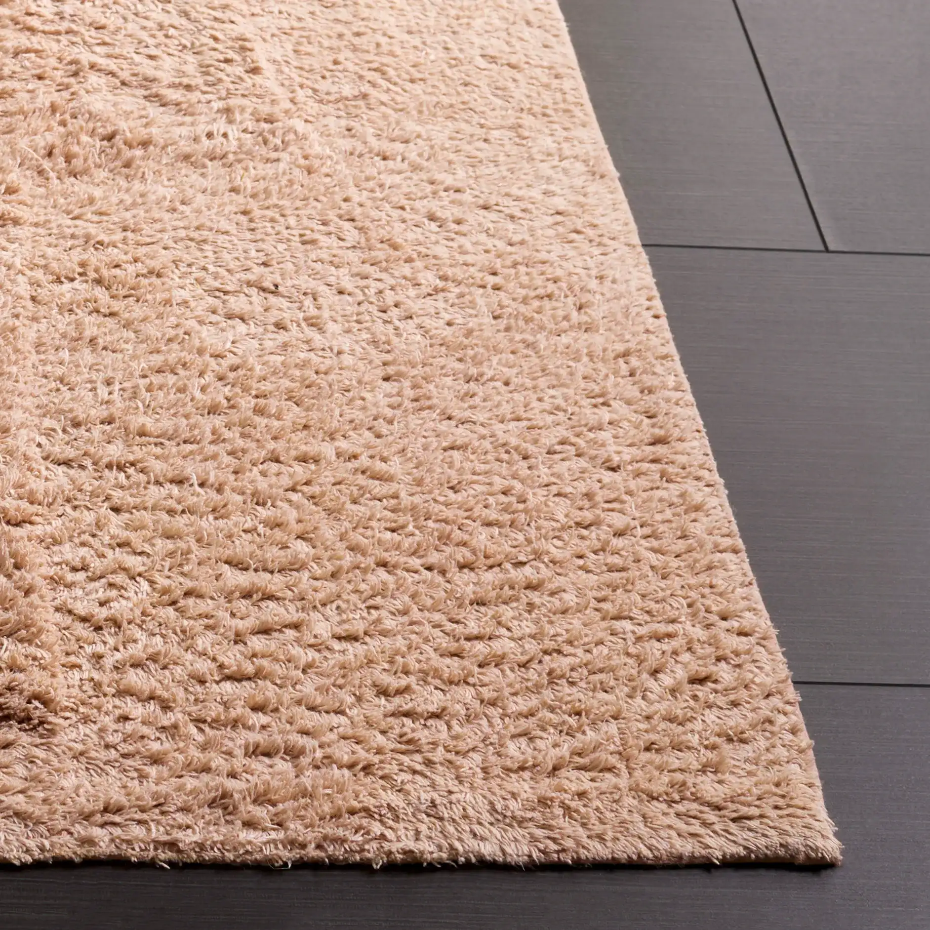 Easy Care Bordered Solid Cotton Washable Rug in Pink in a styled room