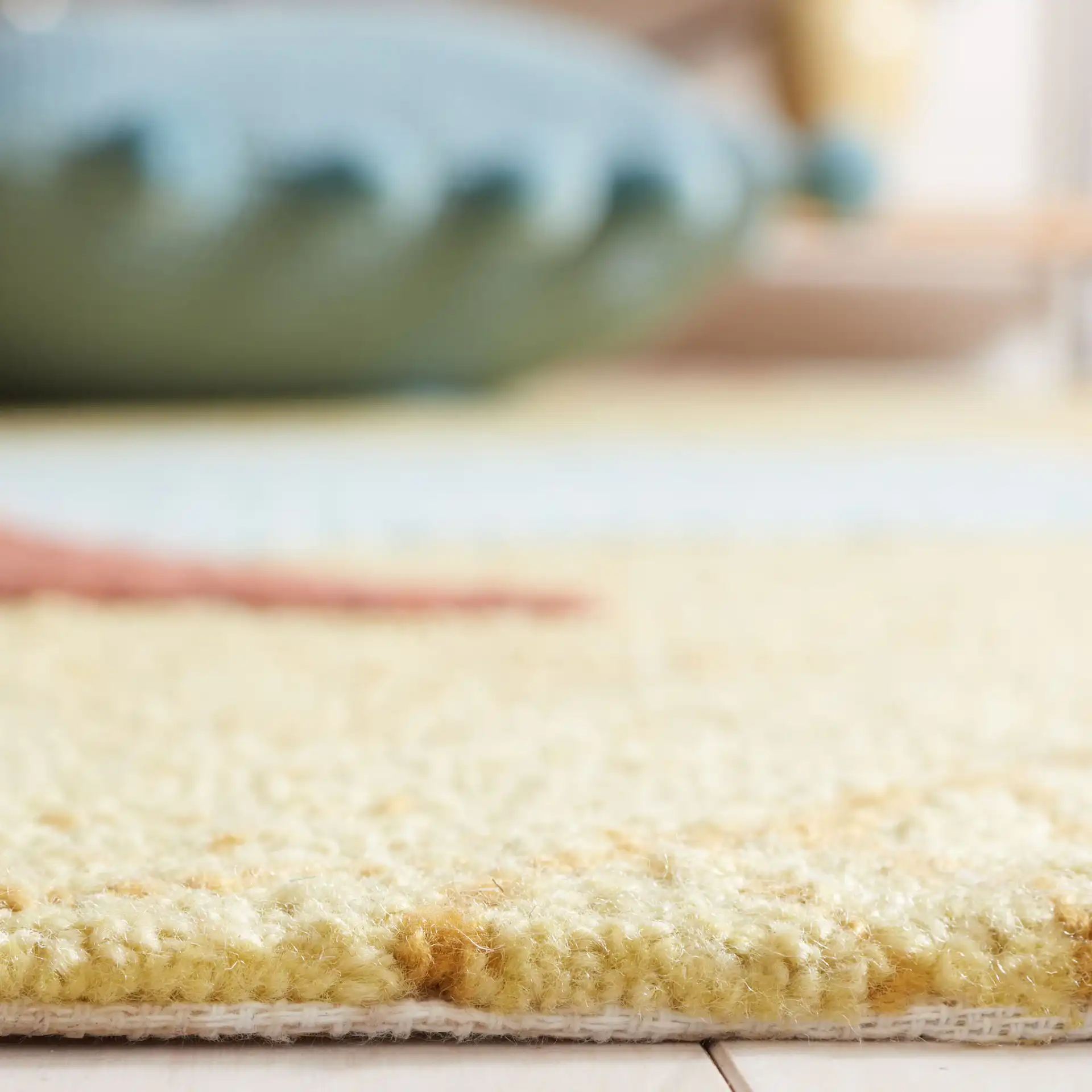 Easy Care Overlapping Leaves Hand-Tufted Rug in Rust / Green in a styled room