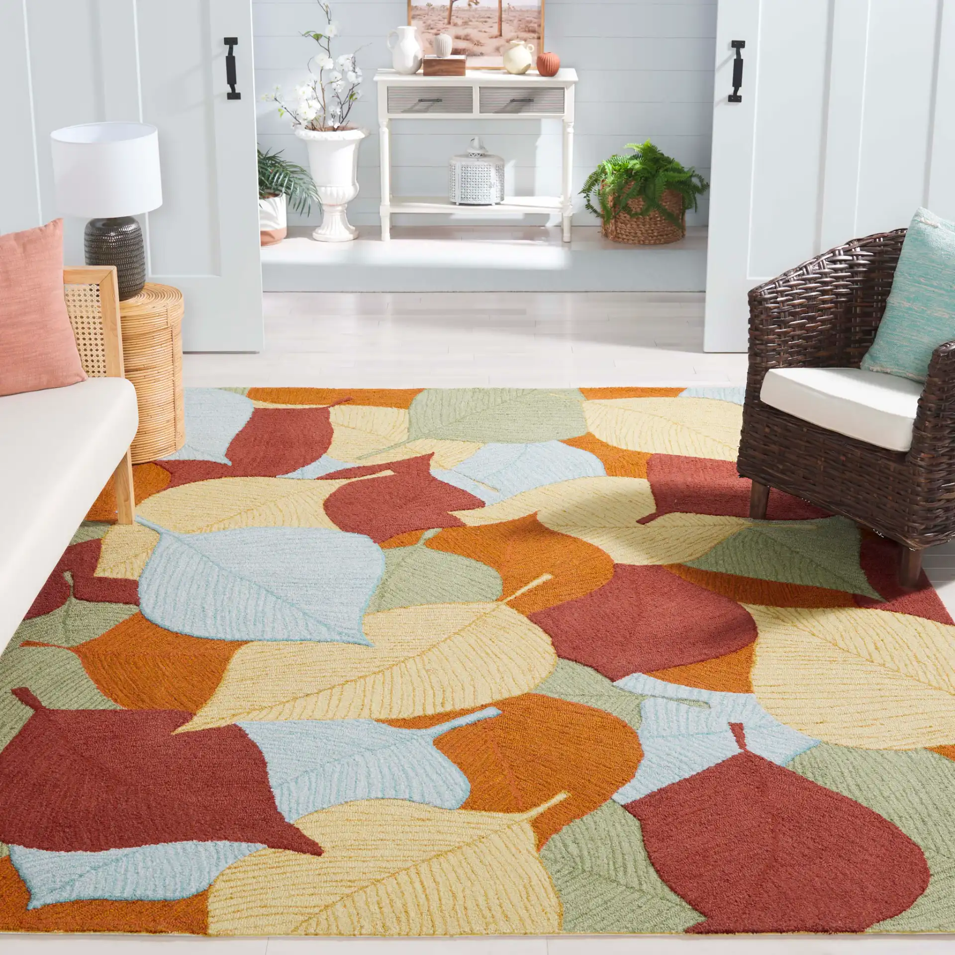 Easy Care Overlapping Leaves Hand-Tufted Rug in Rust / Green in a styled room