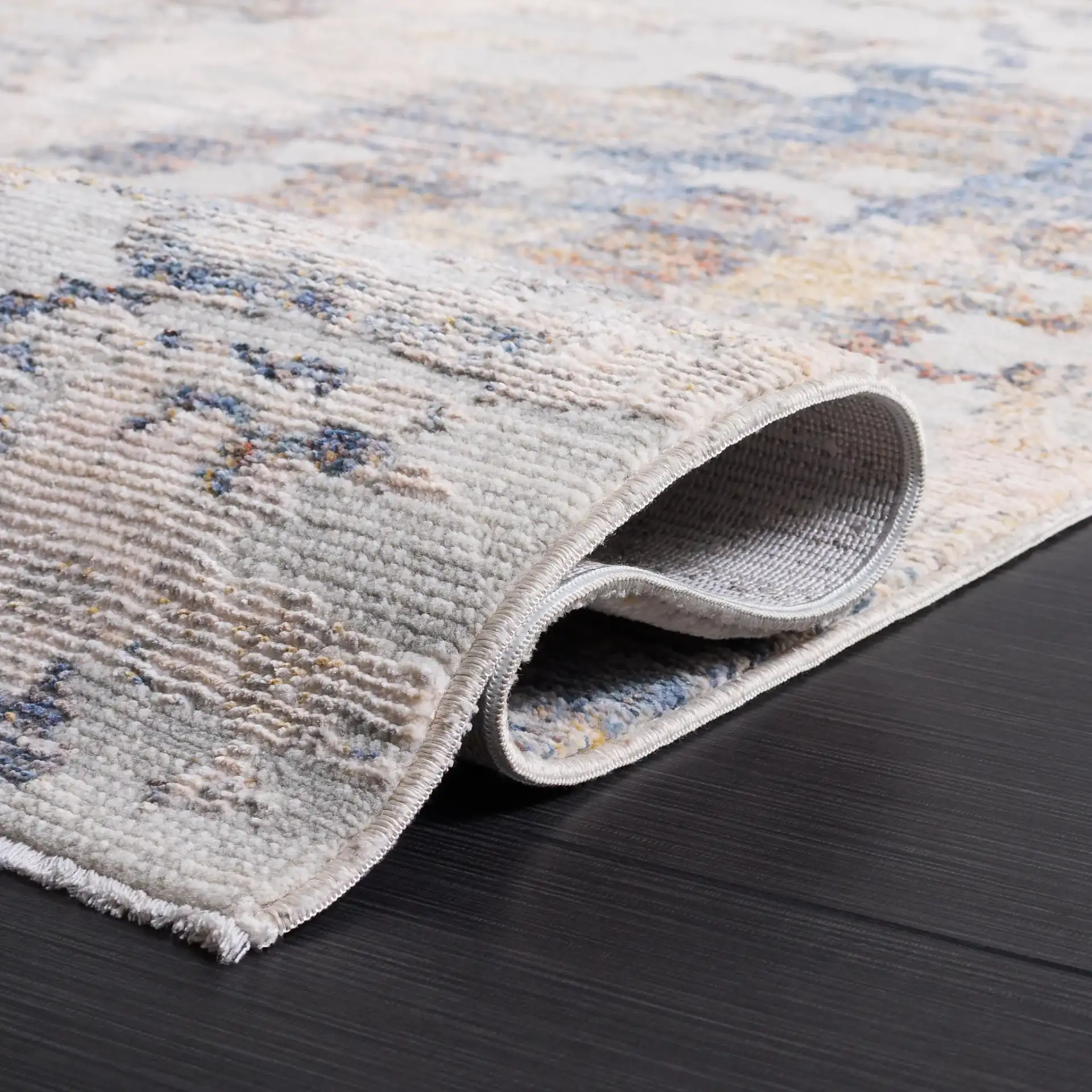 Ellwood Modern Abstract Linear Rug in Ivory / Gray in a styled room