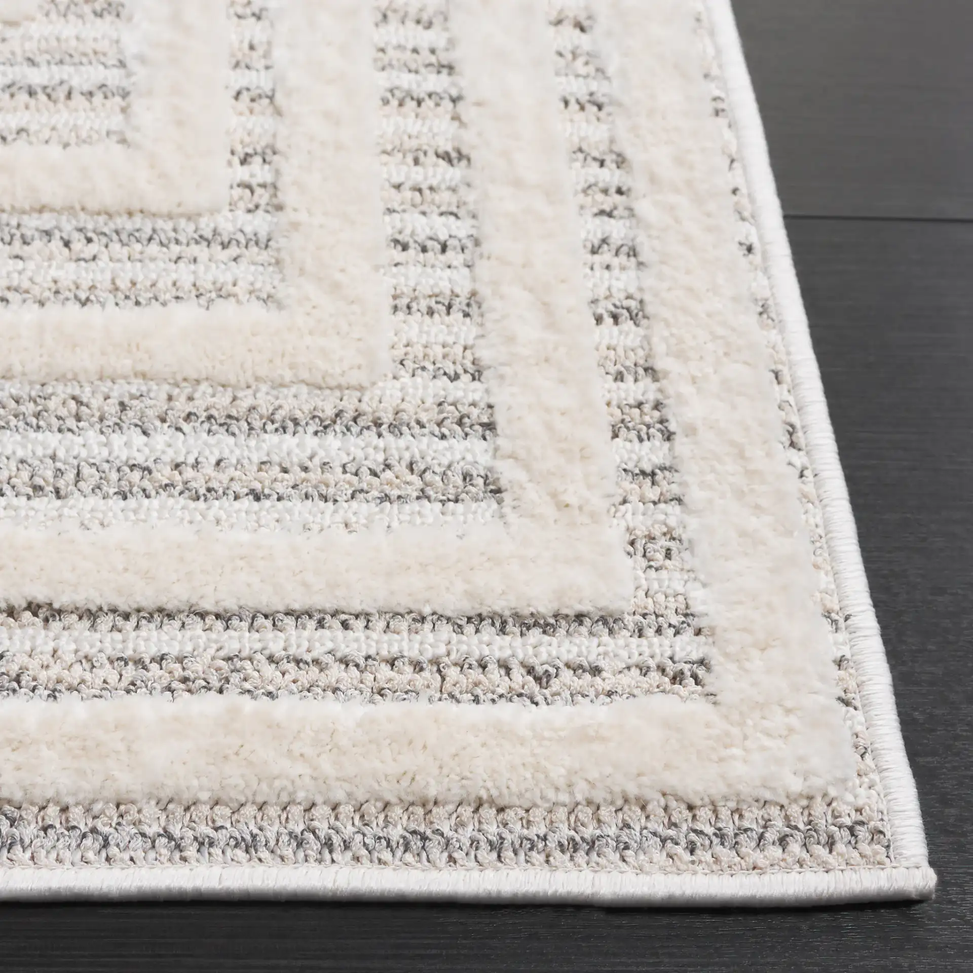 Elmhurst Concentric Square Rug in Ivory / Gray in a styled room