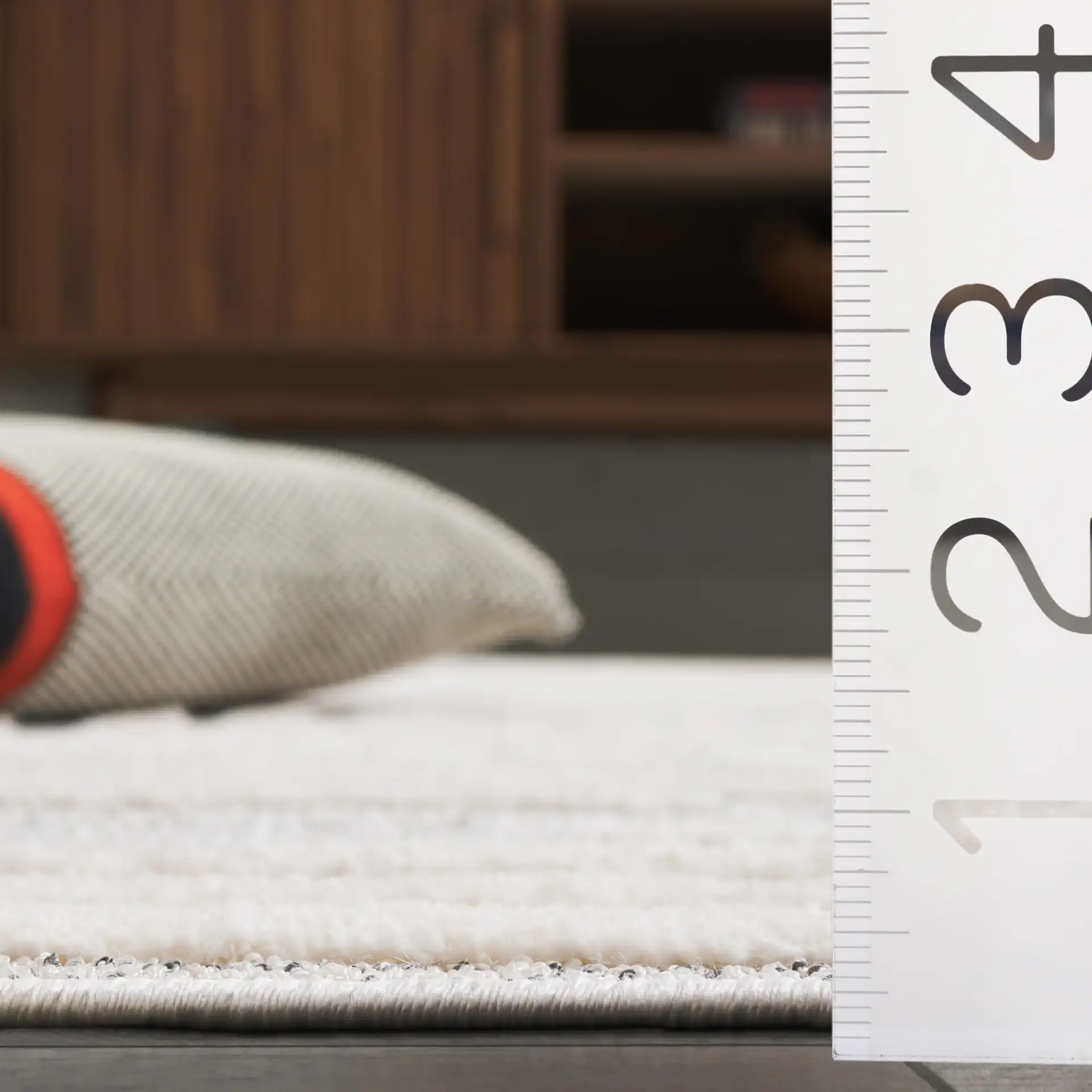 Elmhurst Concentric Square Rug in Ivory / Gray in a styled room