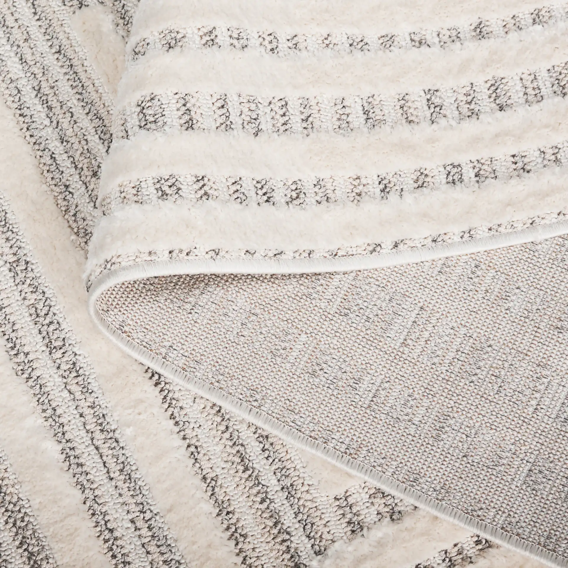 Elmhurst Concentric Square Rug in Ivory / Gray in a styled room