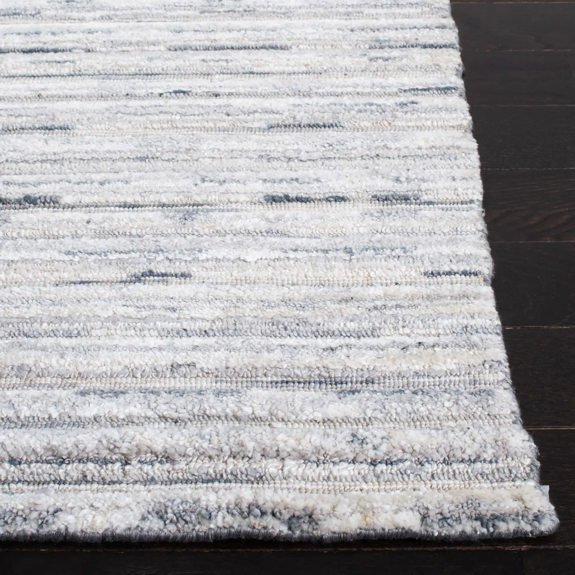 Elements Scandinavian Striped Loom-Knotted Bamboo Silk Rug in Blue / Ivory in a styled room