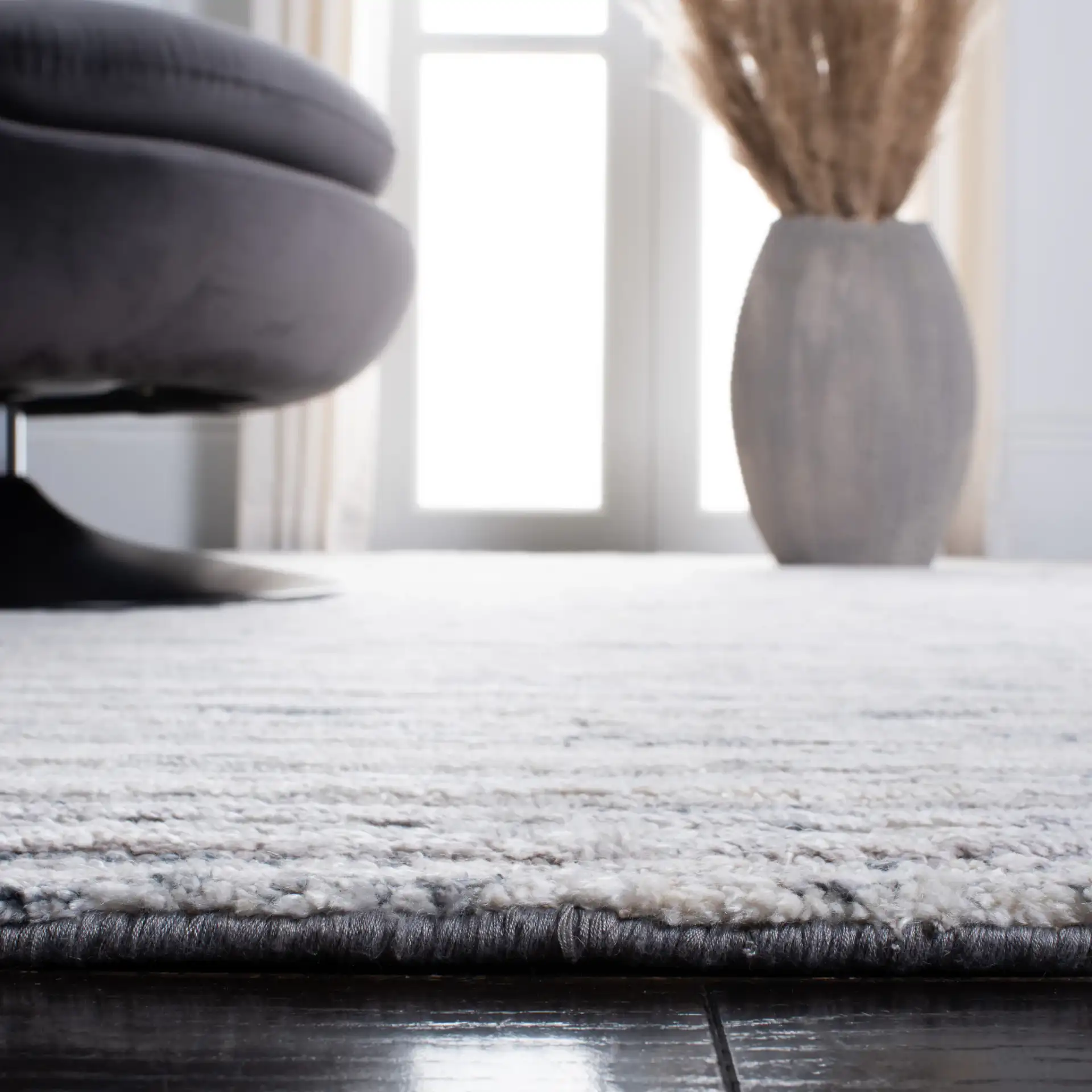 Elements Scandinavian Striped Loom-Knotted Bamboo Silk Rug in Blue / Ivory in a styled room
