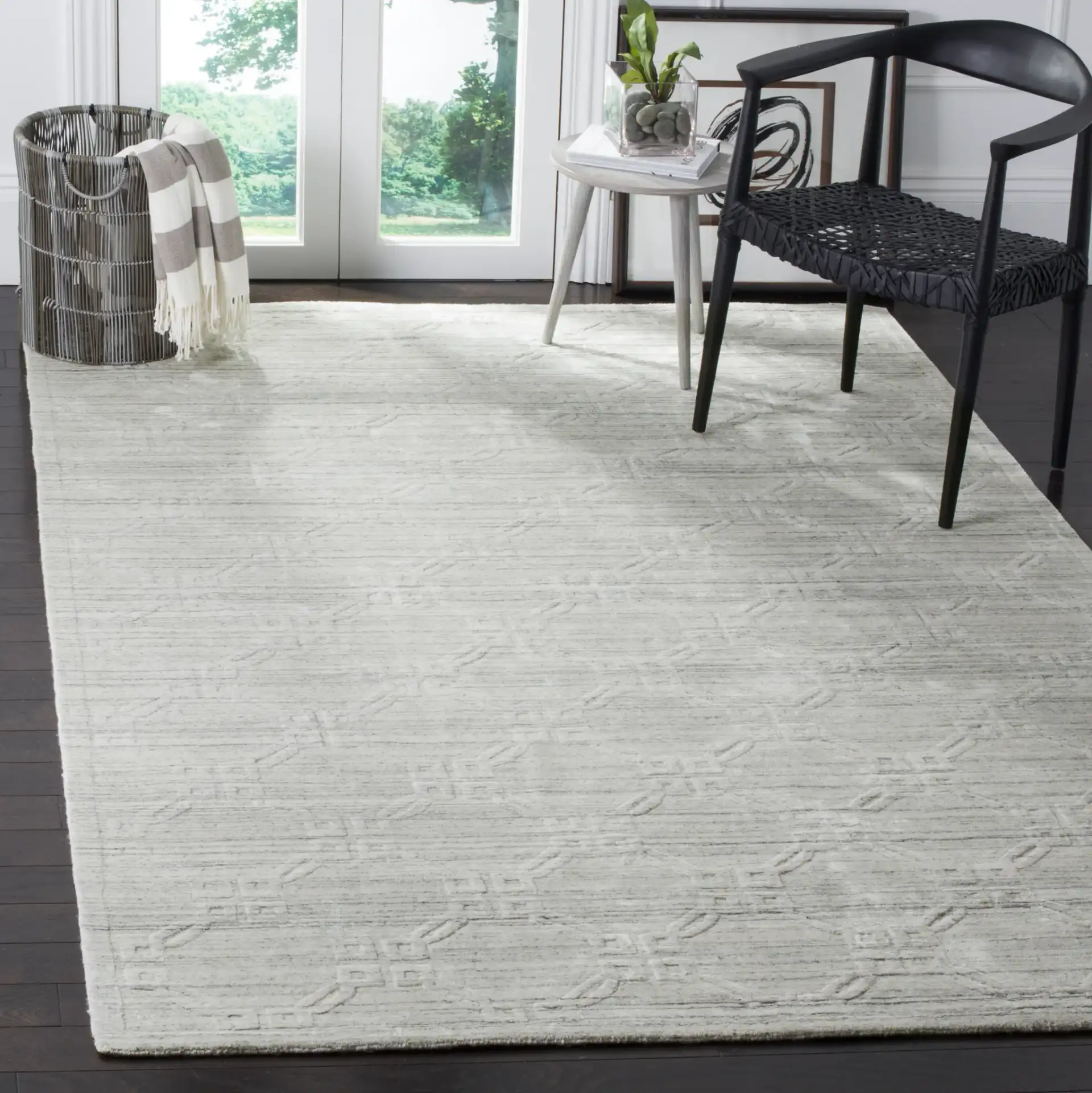 Elements Interlocking Ring Loom-Knotted Rug in Light Gray in a styled room
