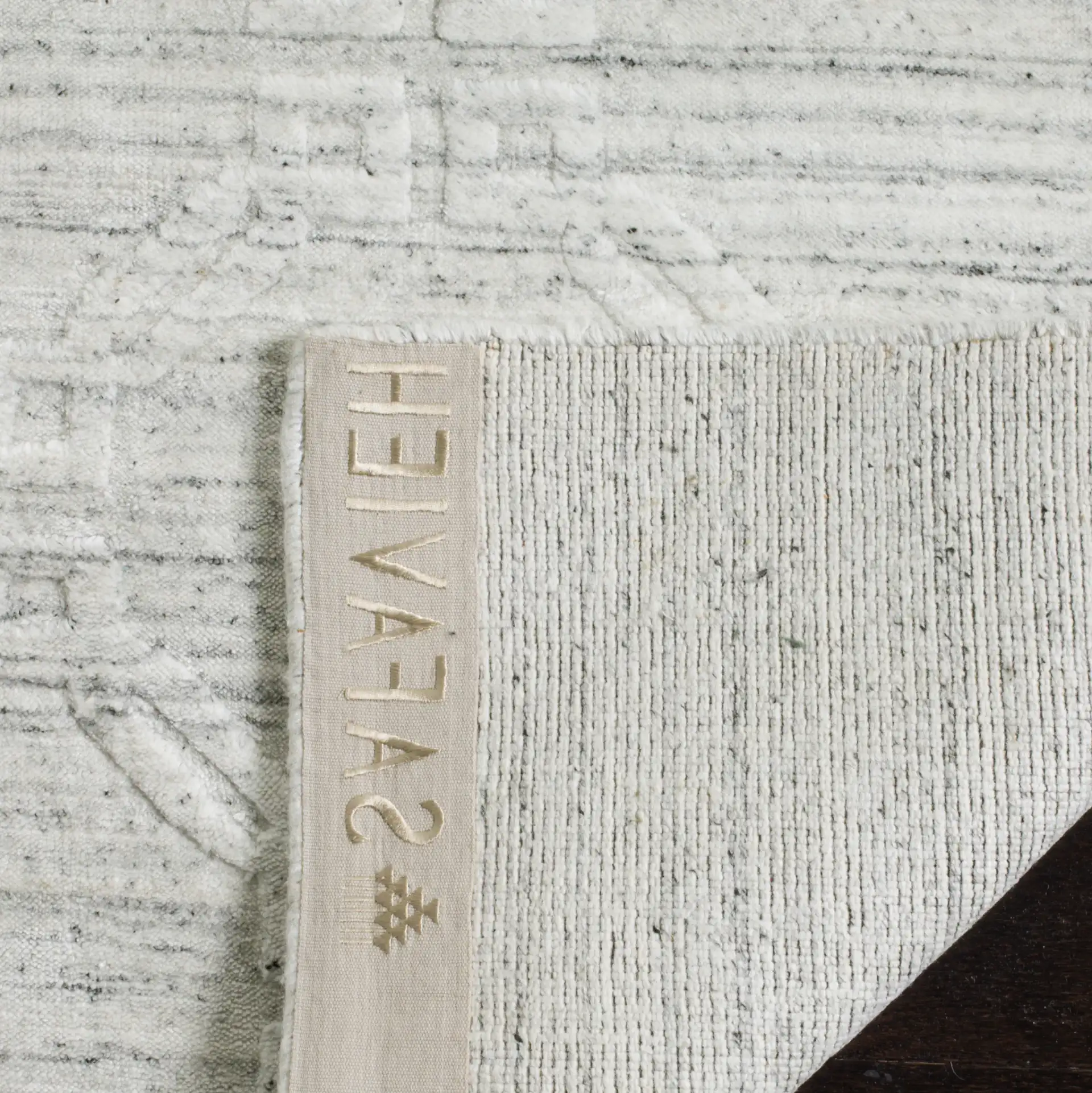 Elements Interlocking Ring Loom-Knotted Rug in Light Gray in a styled room