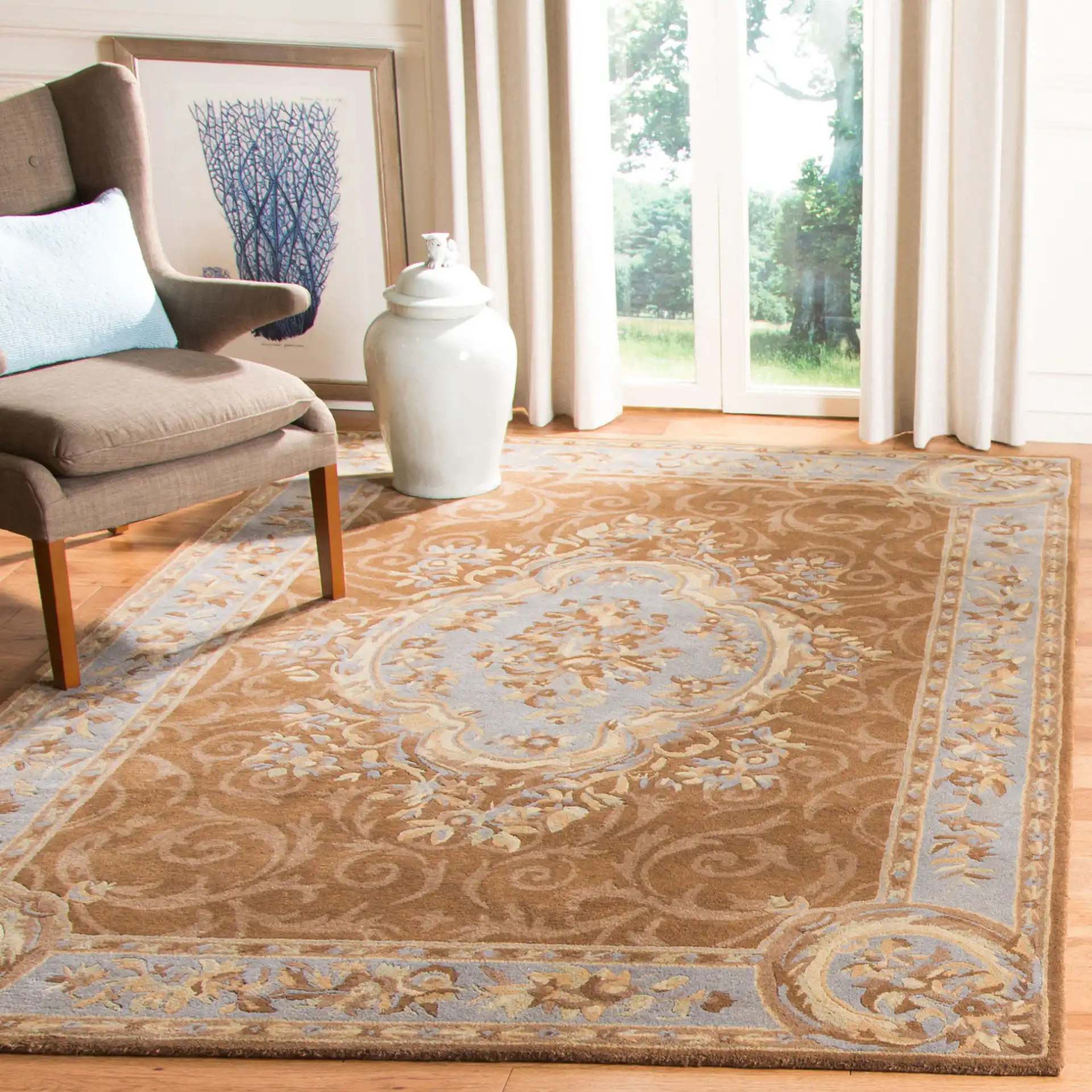Empire Floral Medallion Hand-Tufted Wool Rug in Blue / Brown in a styled room