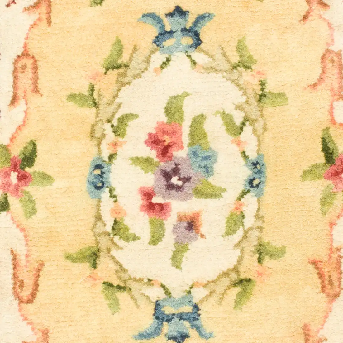 Empire Floral Bouquet Bordered Hand-Tufted Wool Rug in Gold in a styled room