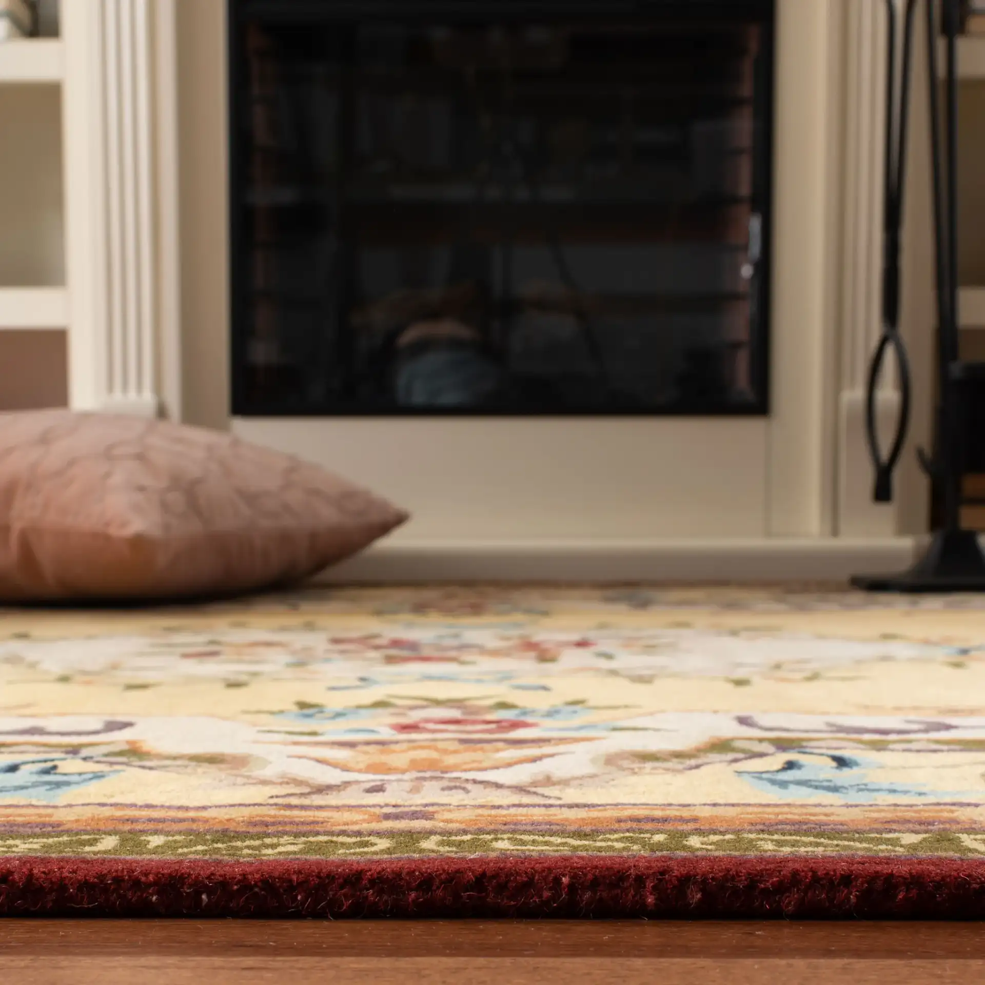 Empire Floral Bouquet Bordered Hand-Tufted Wool Rug in Gold in a styled room