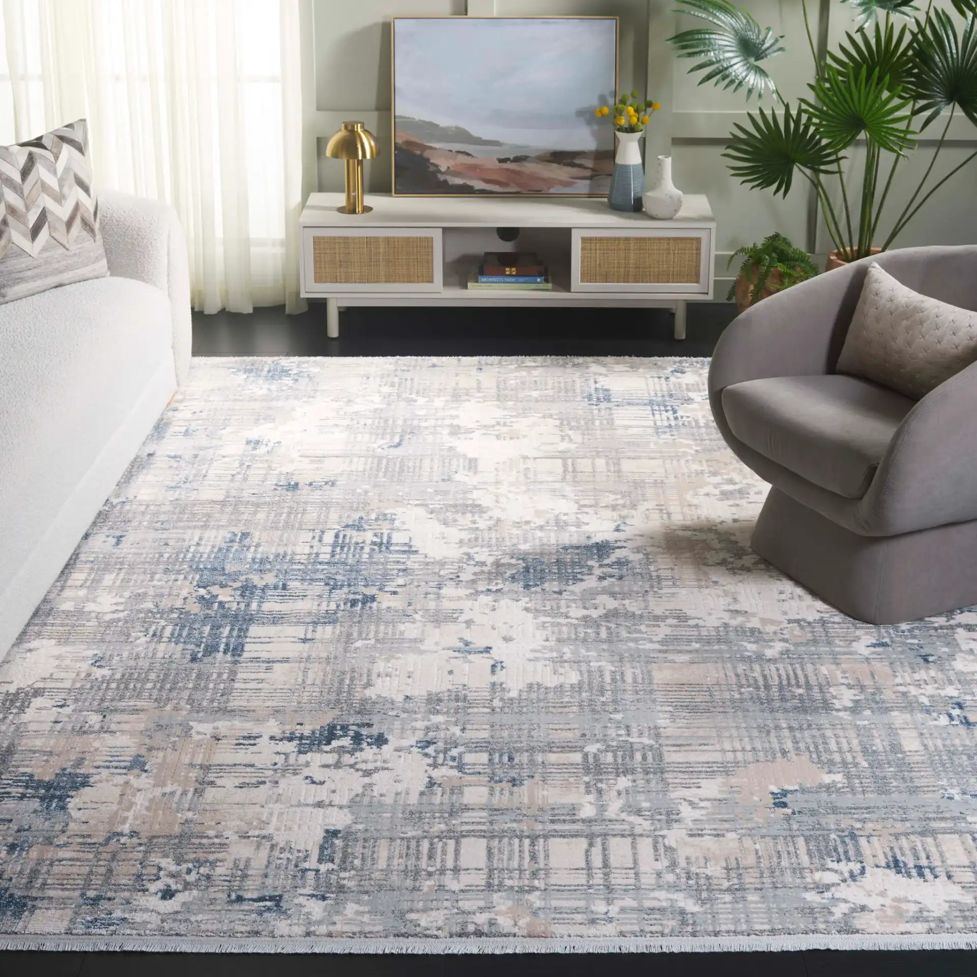 Emerald Distressed Grid Rug in Gray / Blue Ivory in a styled room