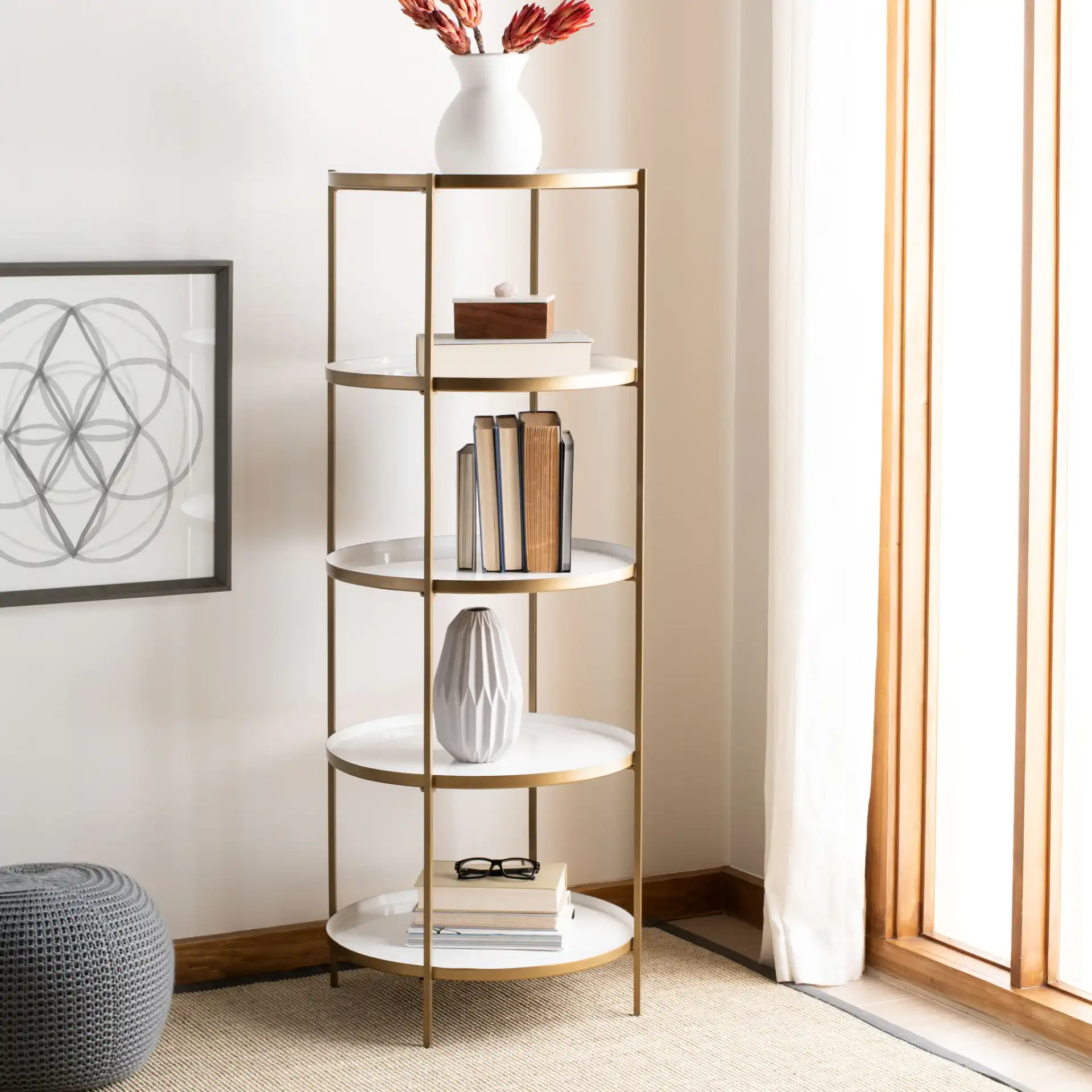 Tia Round Five-Tier Etagere in White / Brass in a styled room