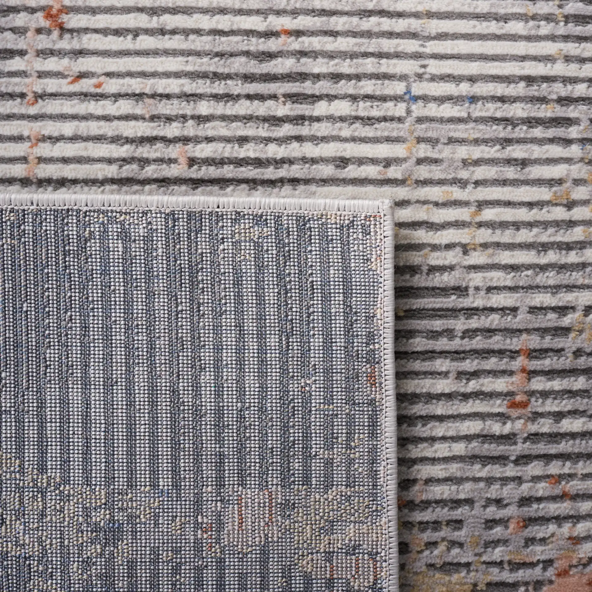 Eternal Weathered Stripe Rug in Gray / Gold in a styled room