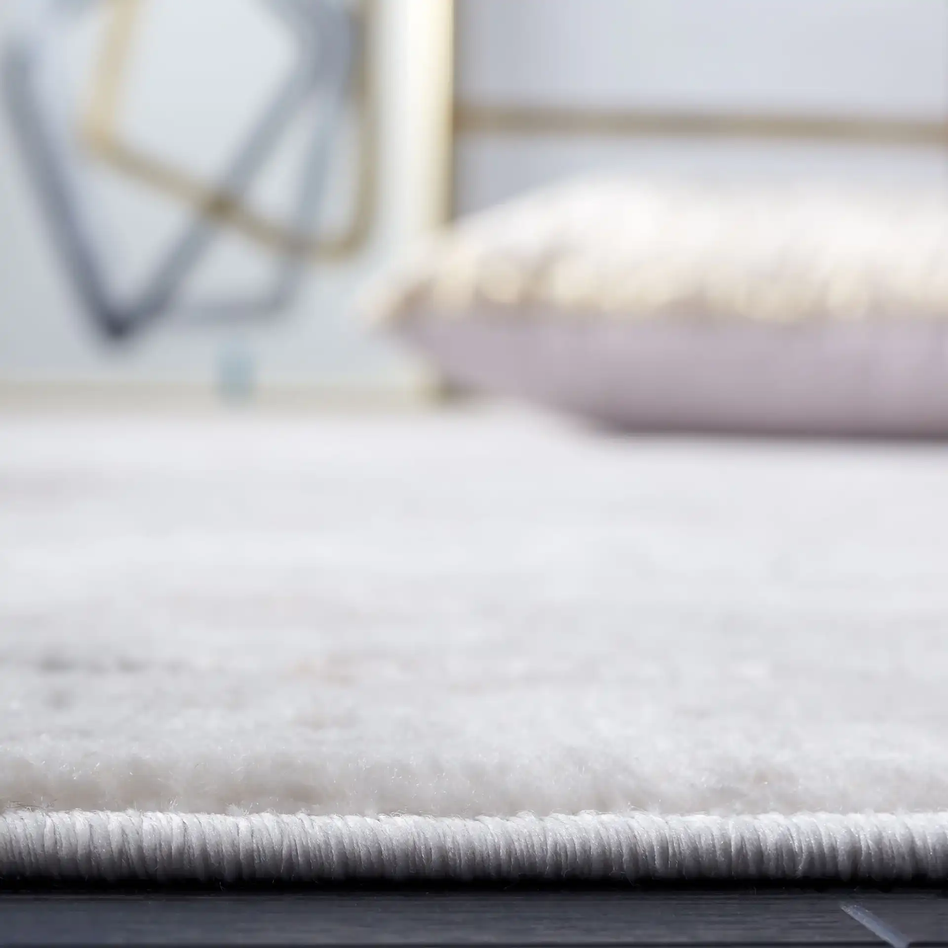 Eternal Linear Abstract Rug in Gray / Ivory in a styled room
