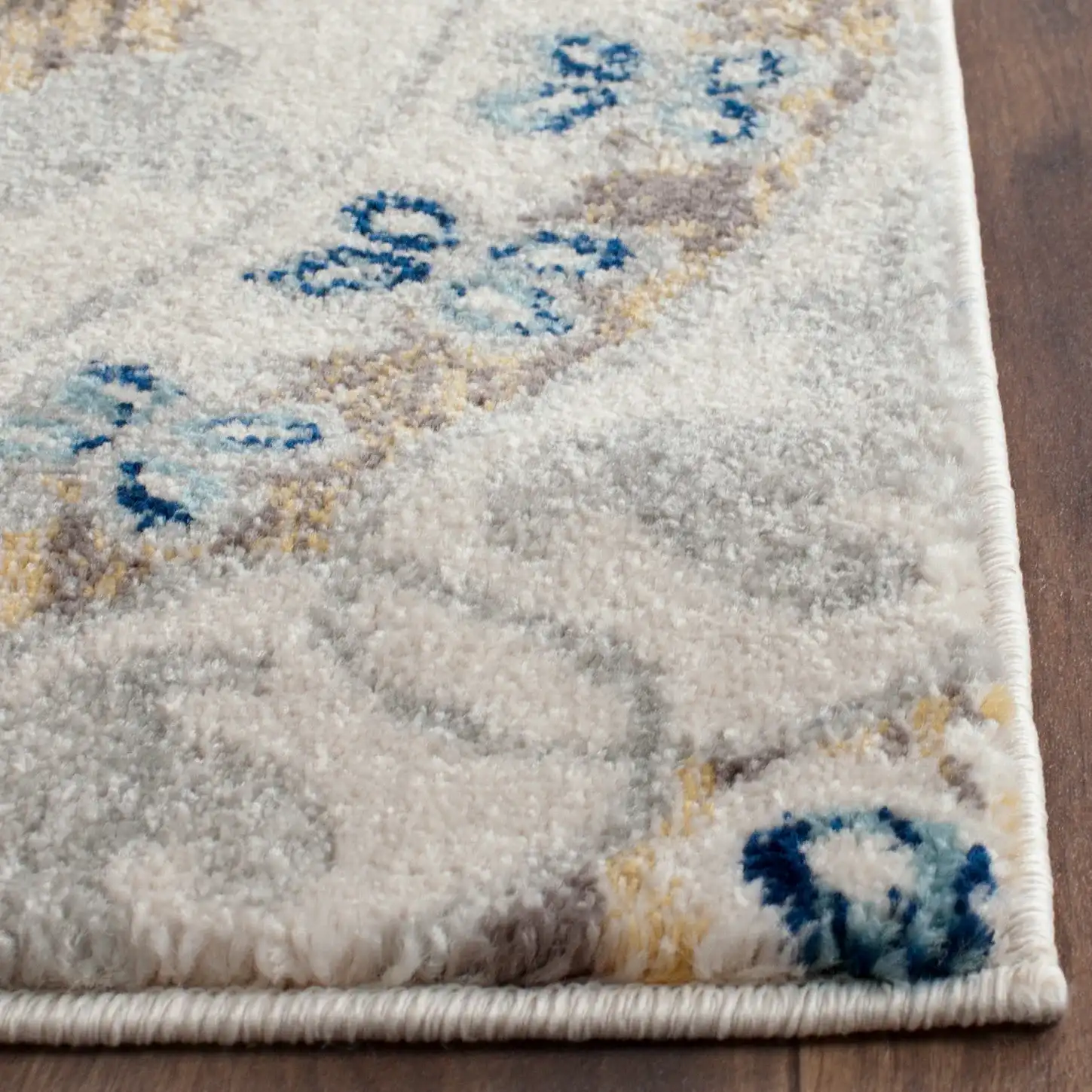 Evoke Circular Medallion Rug in Ivory / Blue in a styled room