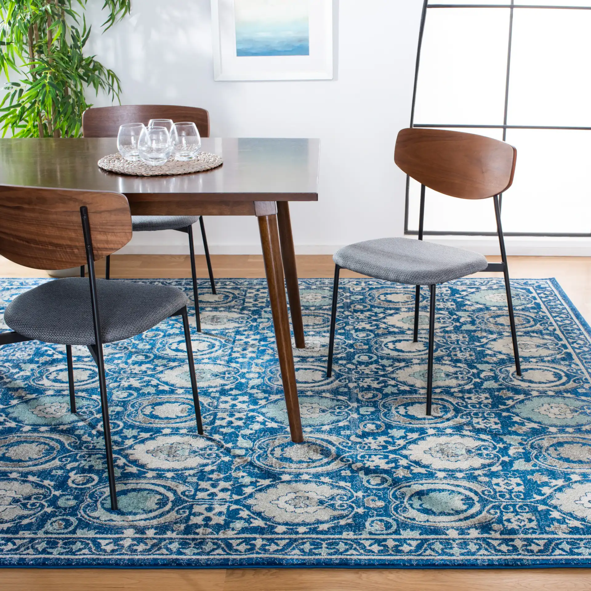 Evoke Oval Medallion Rug in Blue / Ivory in a styled room