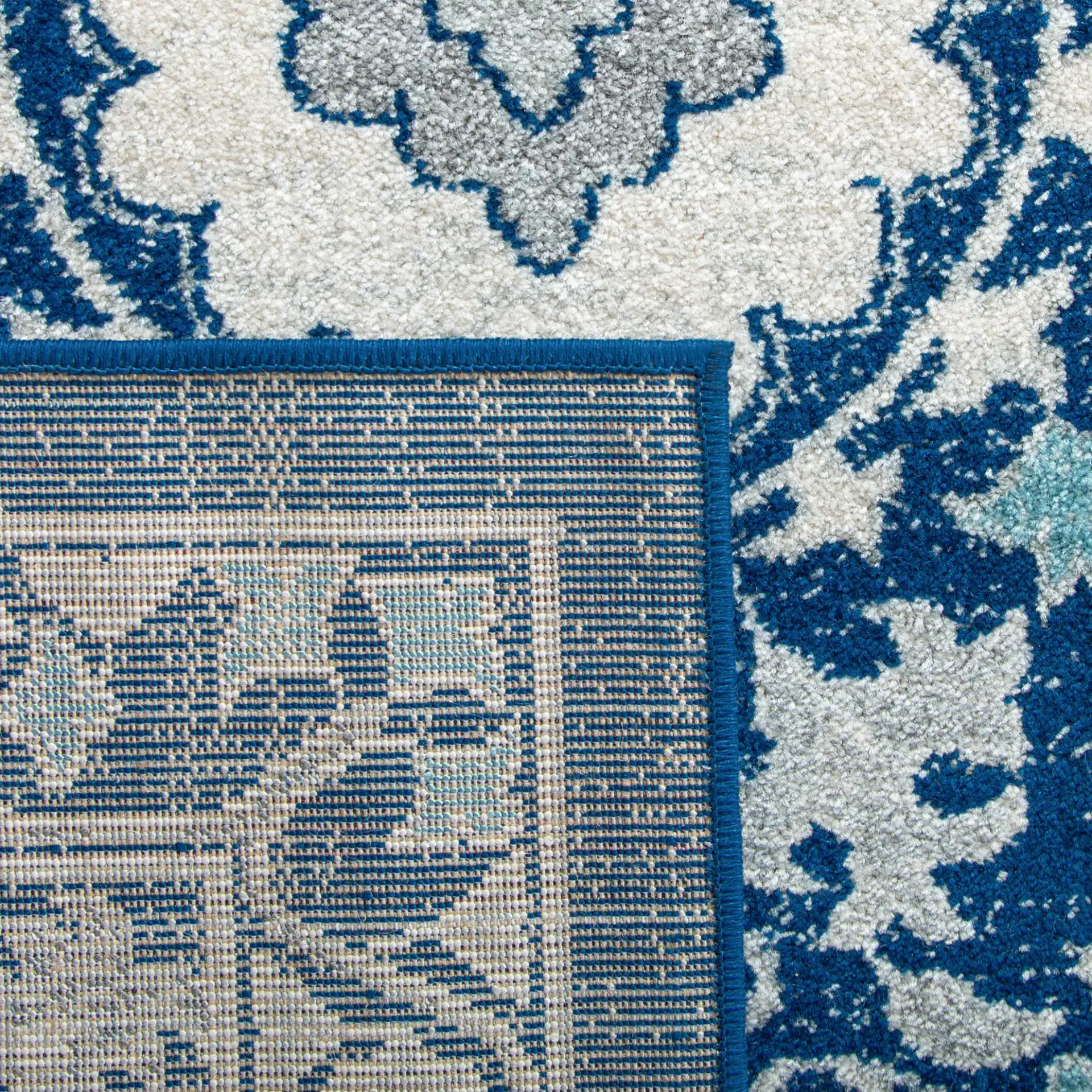 Evoke Oval Medallion Rug in Blue / Ivory in a styled room