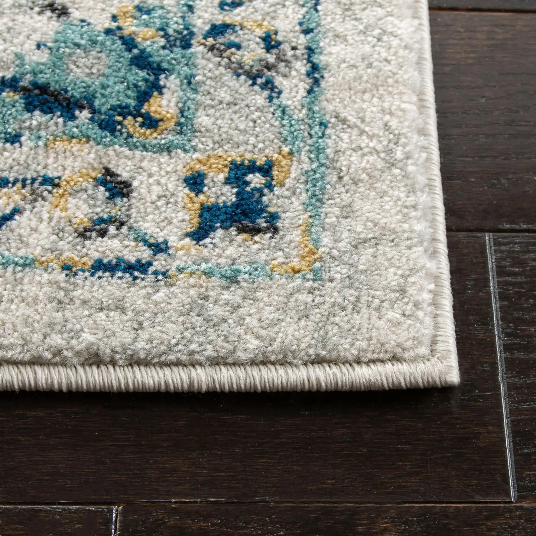 Evoke Repeating Medallion Rug in Ivory / Blue