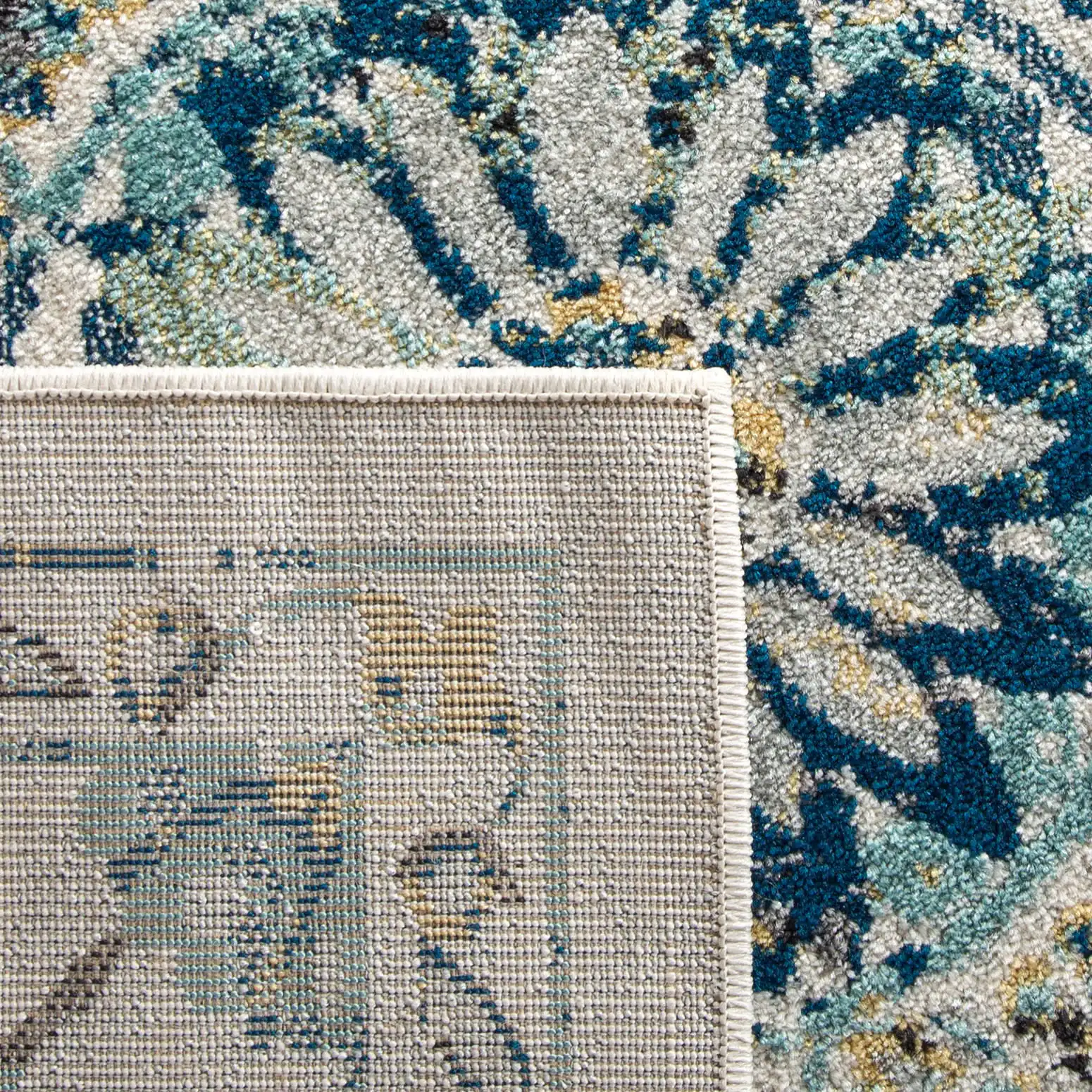 Evoke Repeating Medallion Rug in Ivory / Blue in a styled room