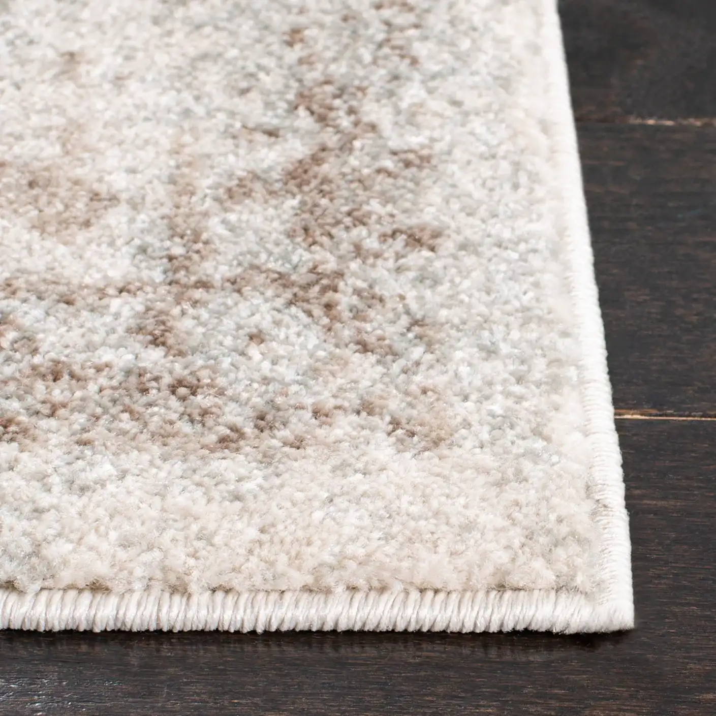 Evoke Distressed Medallion Rug in Ivory / Taupe in a styled room