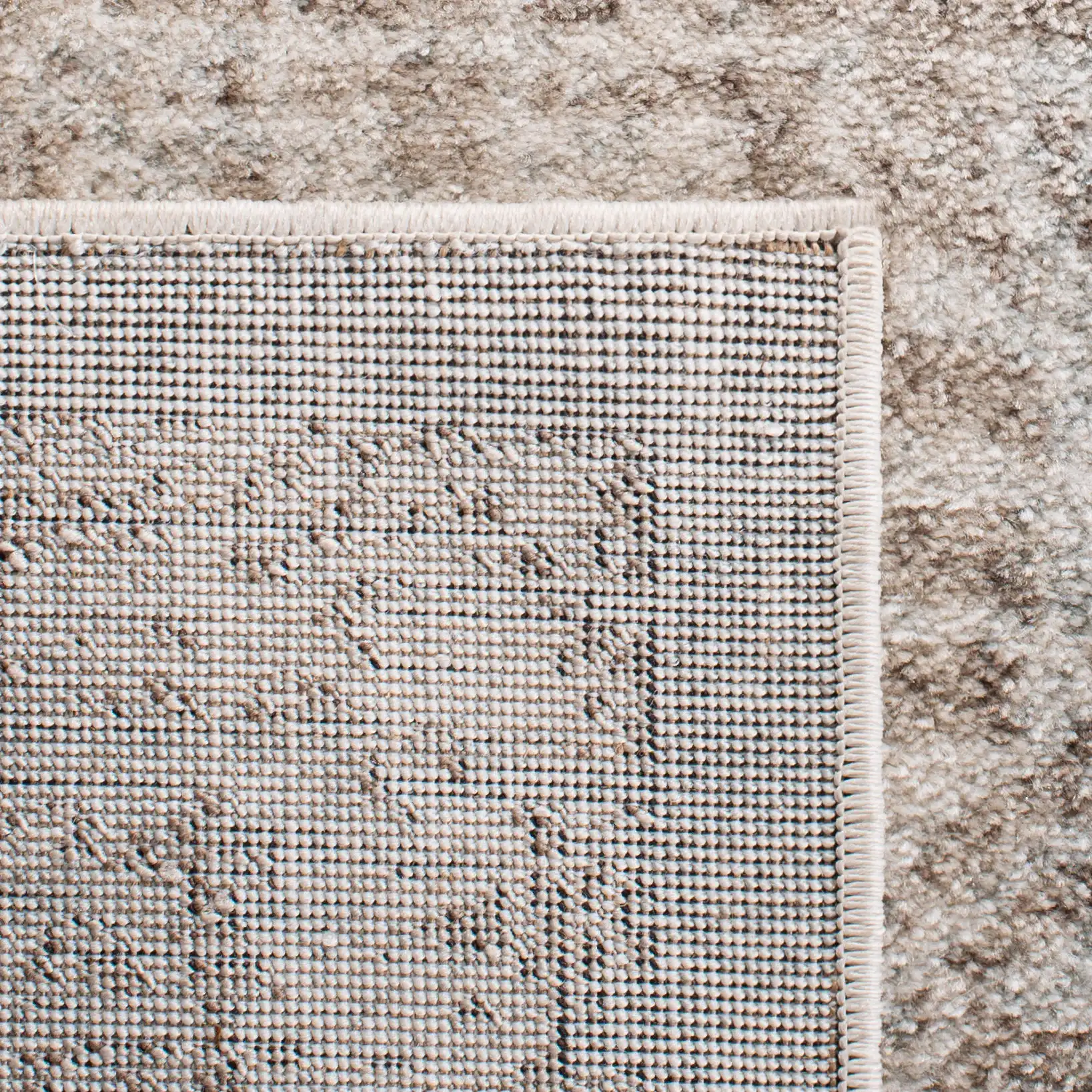 Evoke Distressed Medallion Rug in Ivory / Taupe in a styled room