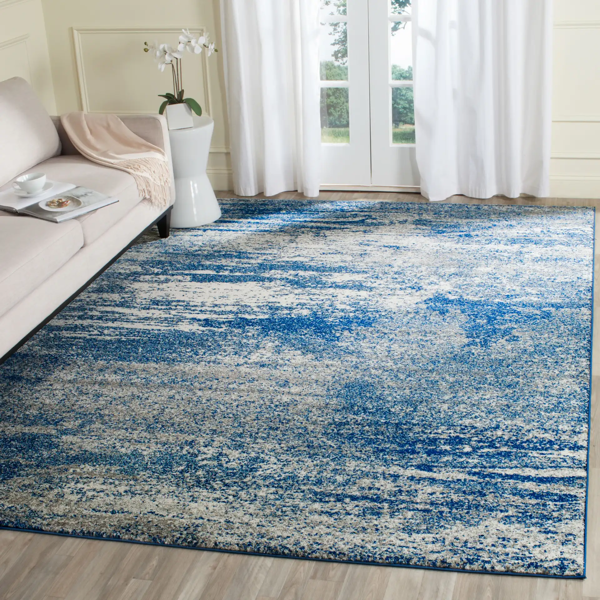 Evoke Abstract Brushstroke Rug in Navy / Ivory in a styled room