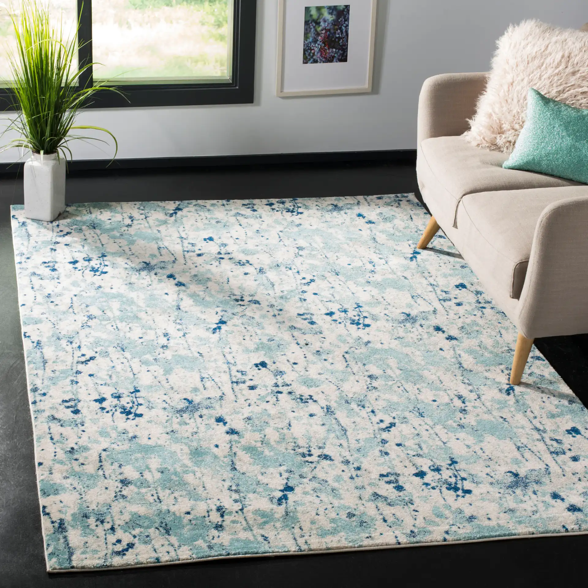 Evoke Abstract Splatter Rug in Ivory / Blue in a styled room