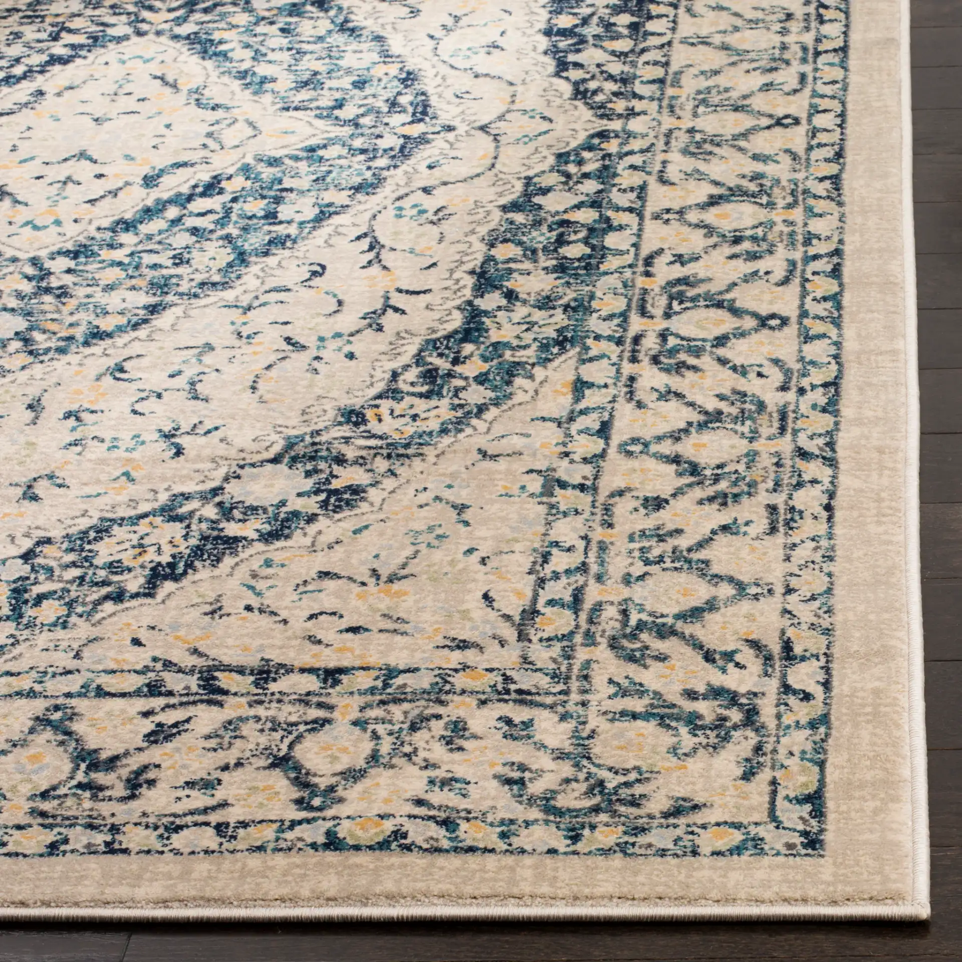 Evoke Concentric Medallion Rug in Beige / Navy in a styled room