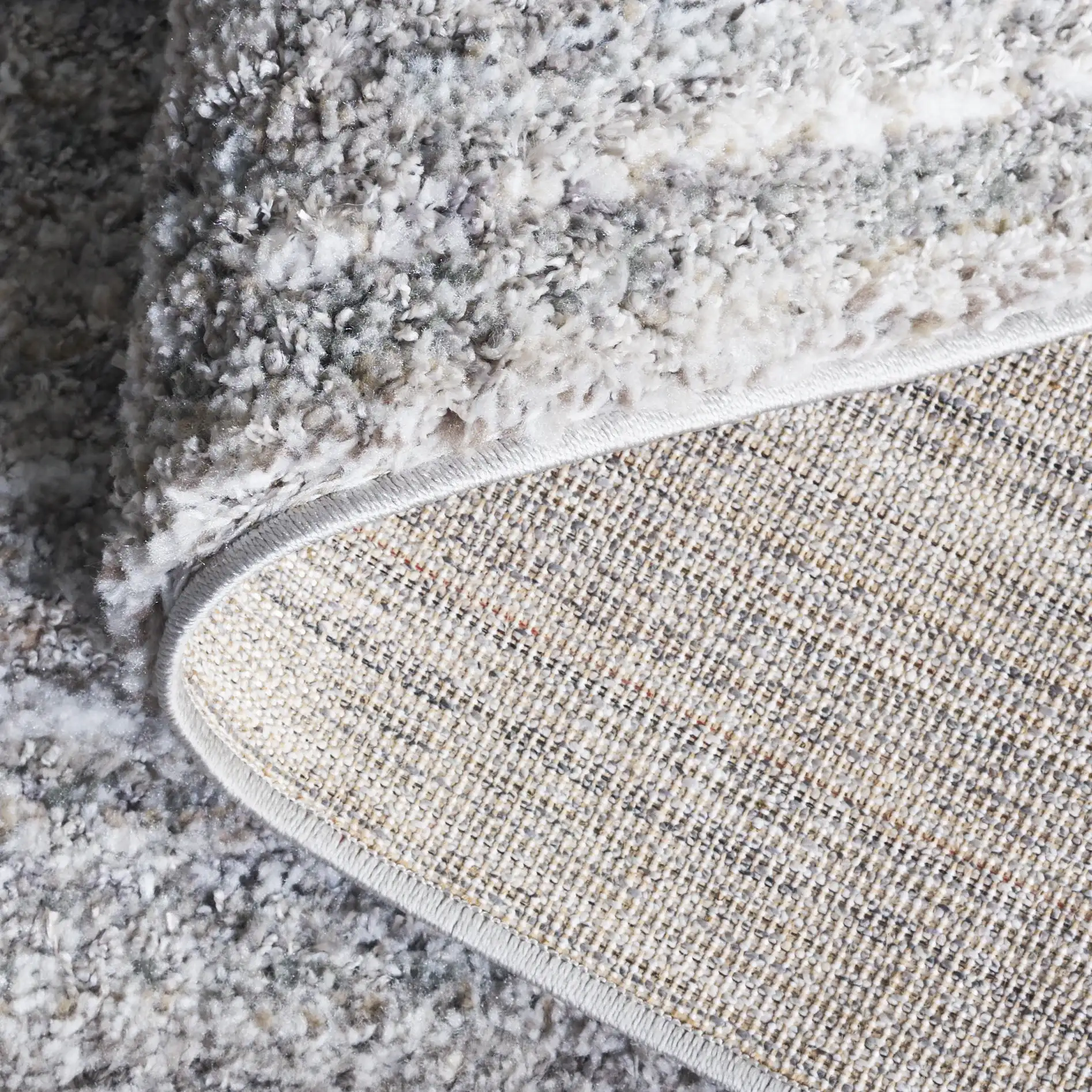Everett Striated Shag Rug in Gray / Beige in a styled room