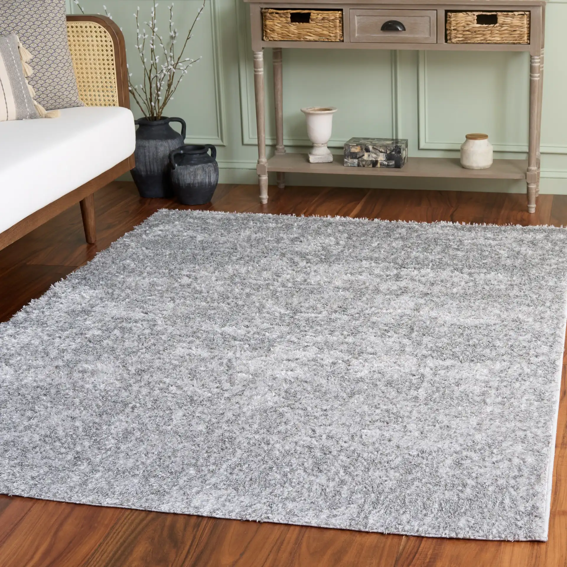 Everett Solid Shag Rug in Gray in a styled room