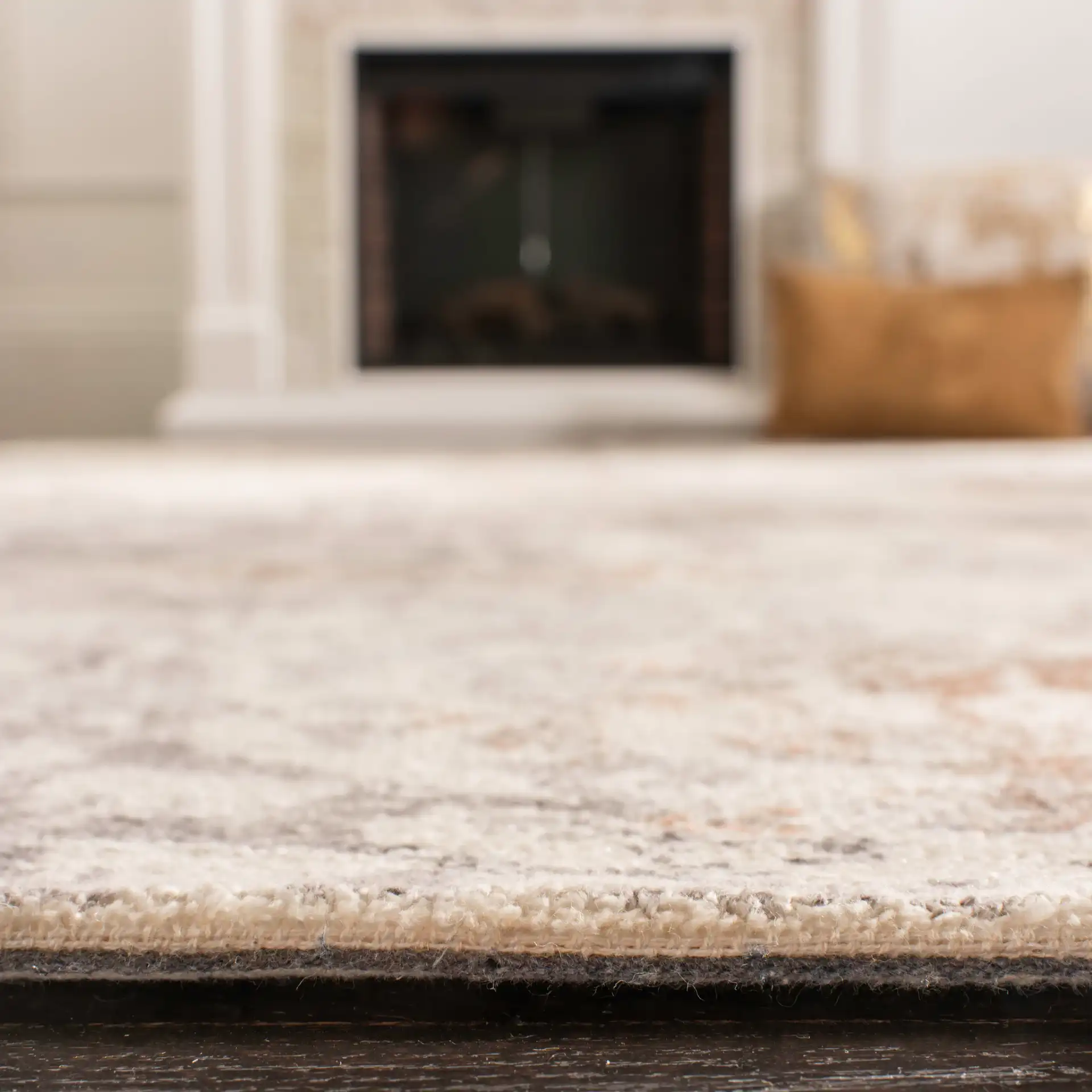 Expression Distressed Damask Hand-Tufted Viscose Rug in Ivory / Gray in a styled room