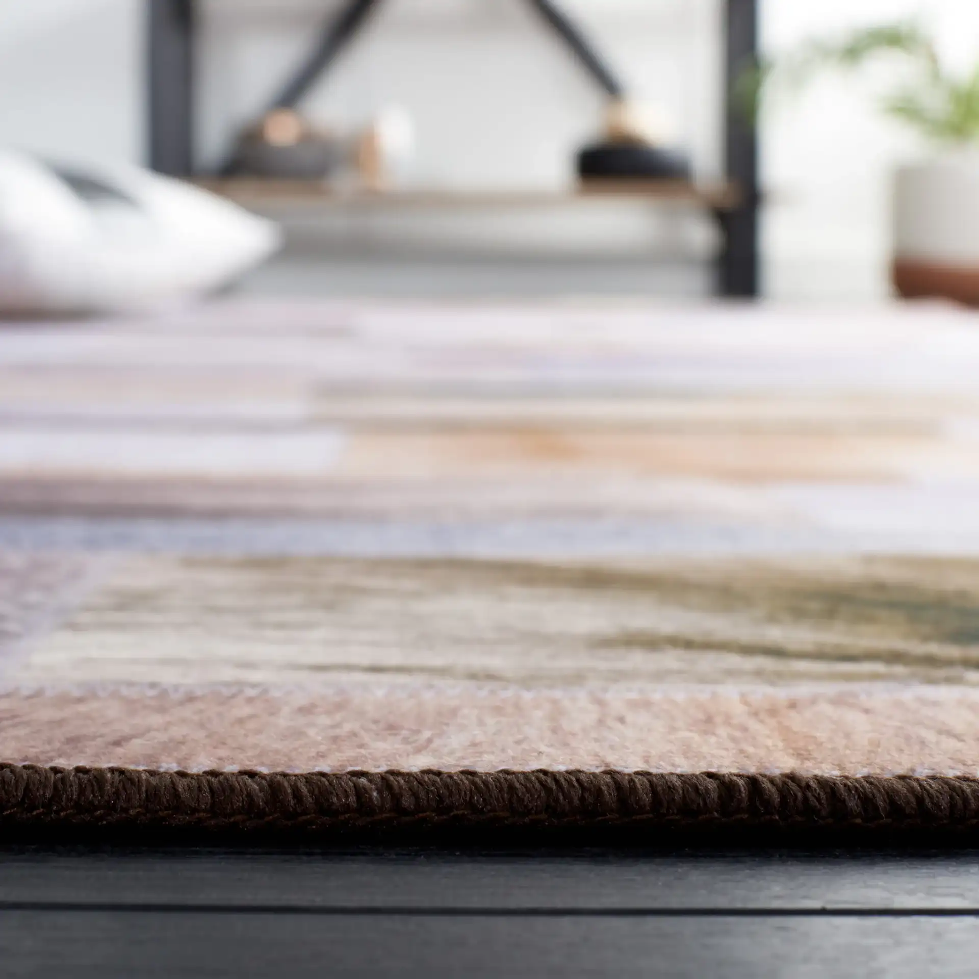 Faux Hide Linear Patchwork Washable Rug in Beige / Purple in a styled room