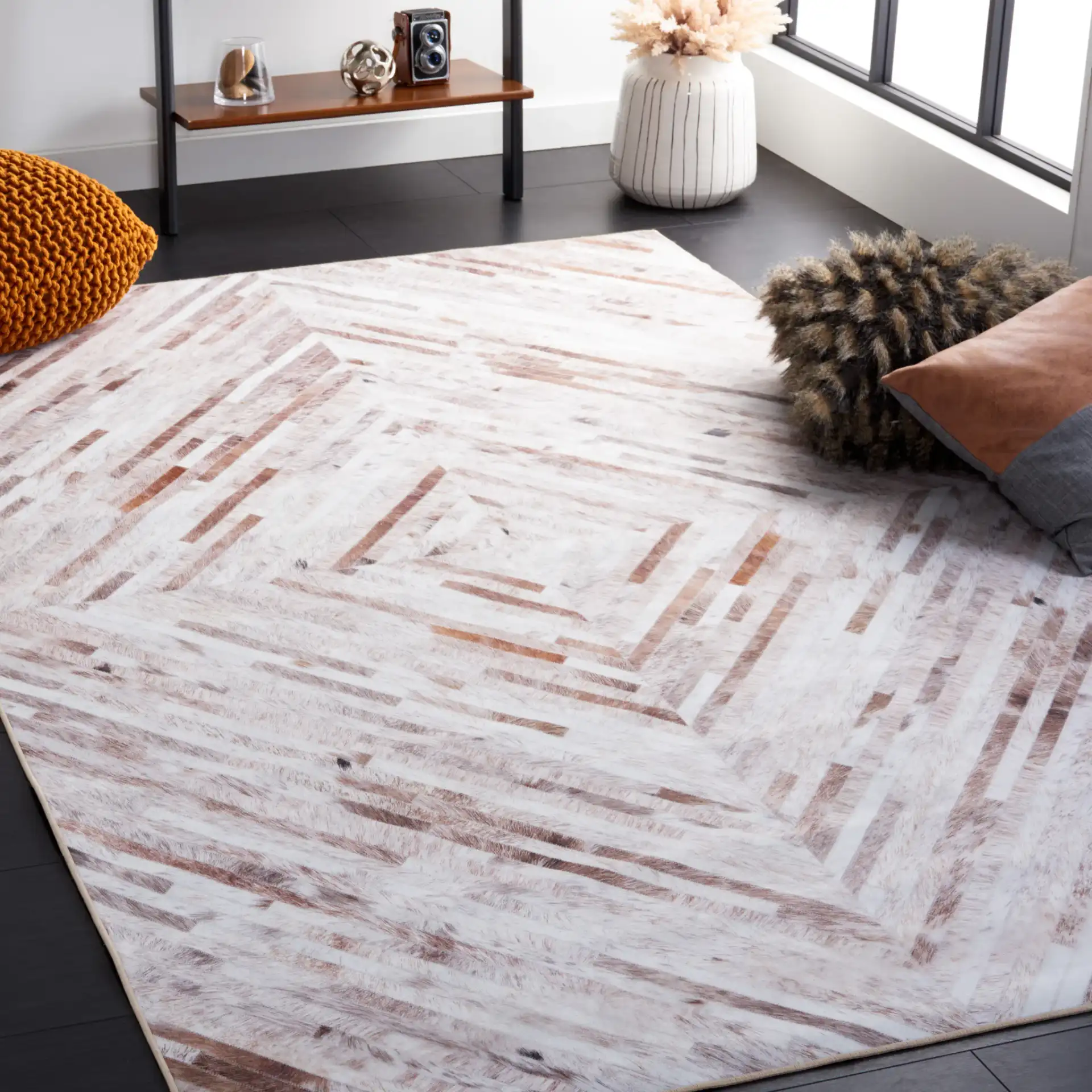 Faux Hide Patchwork Diamond Washable Rug in Beige / Brown in a styled room