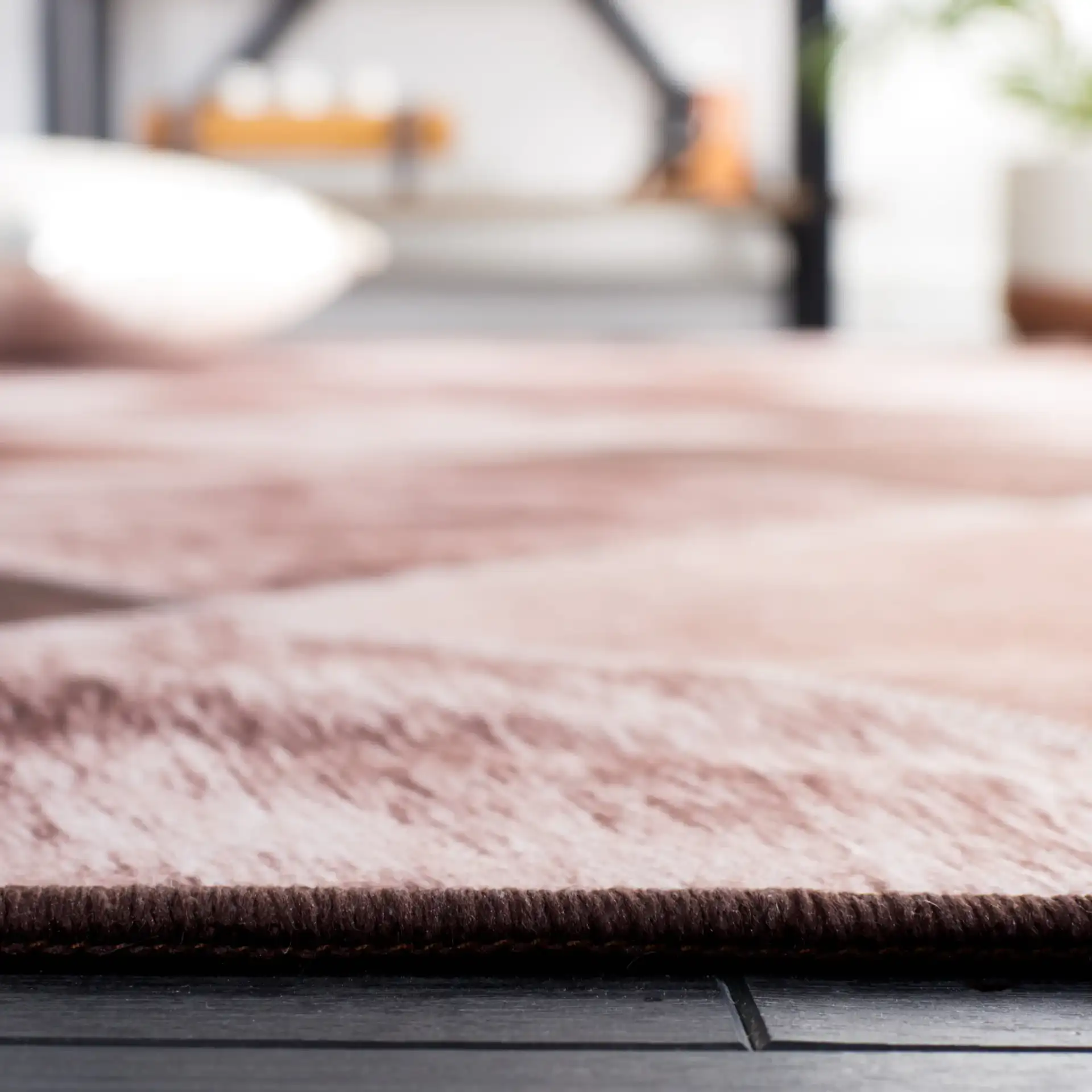 Faux Hide Diamond Patchwork Washable Rug in Light Brown / Brown in a styled room