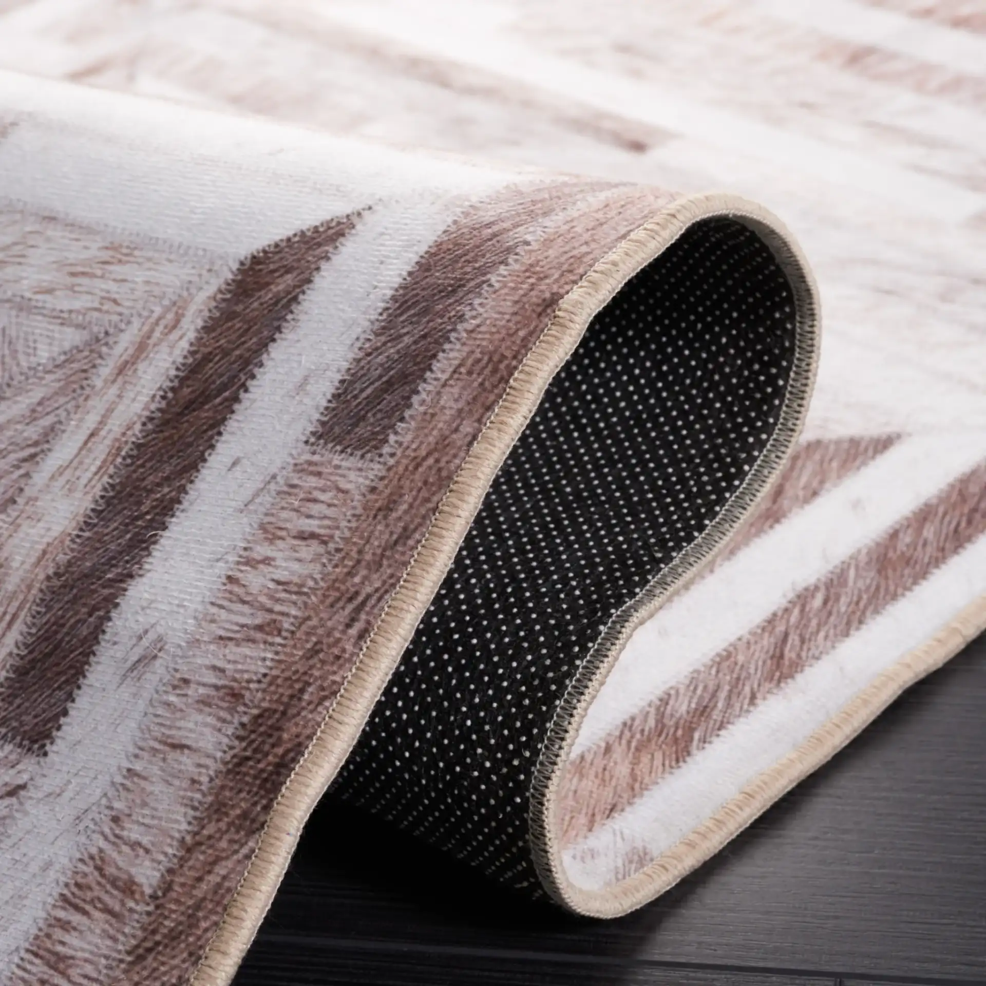 Faux Hide Concentric Square Patchwork Washable Rug in Beige / Brown in a styled room