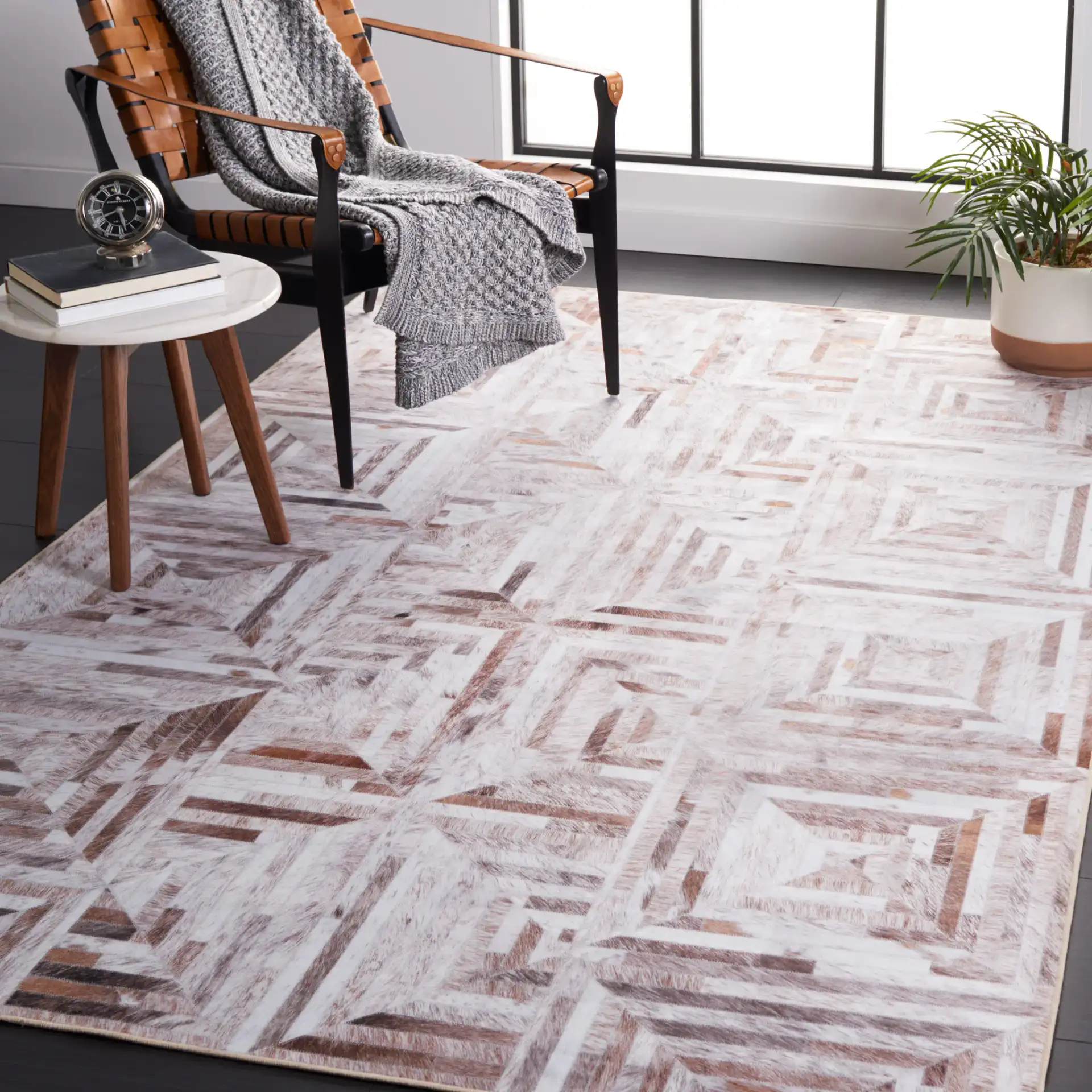 Faux Hide Concentric Square Patchwork Washable Rug in Beige / Brown in a styled room