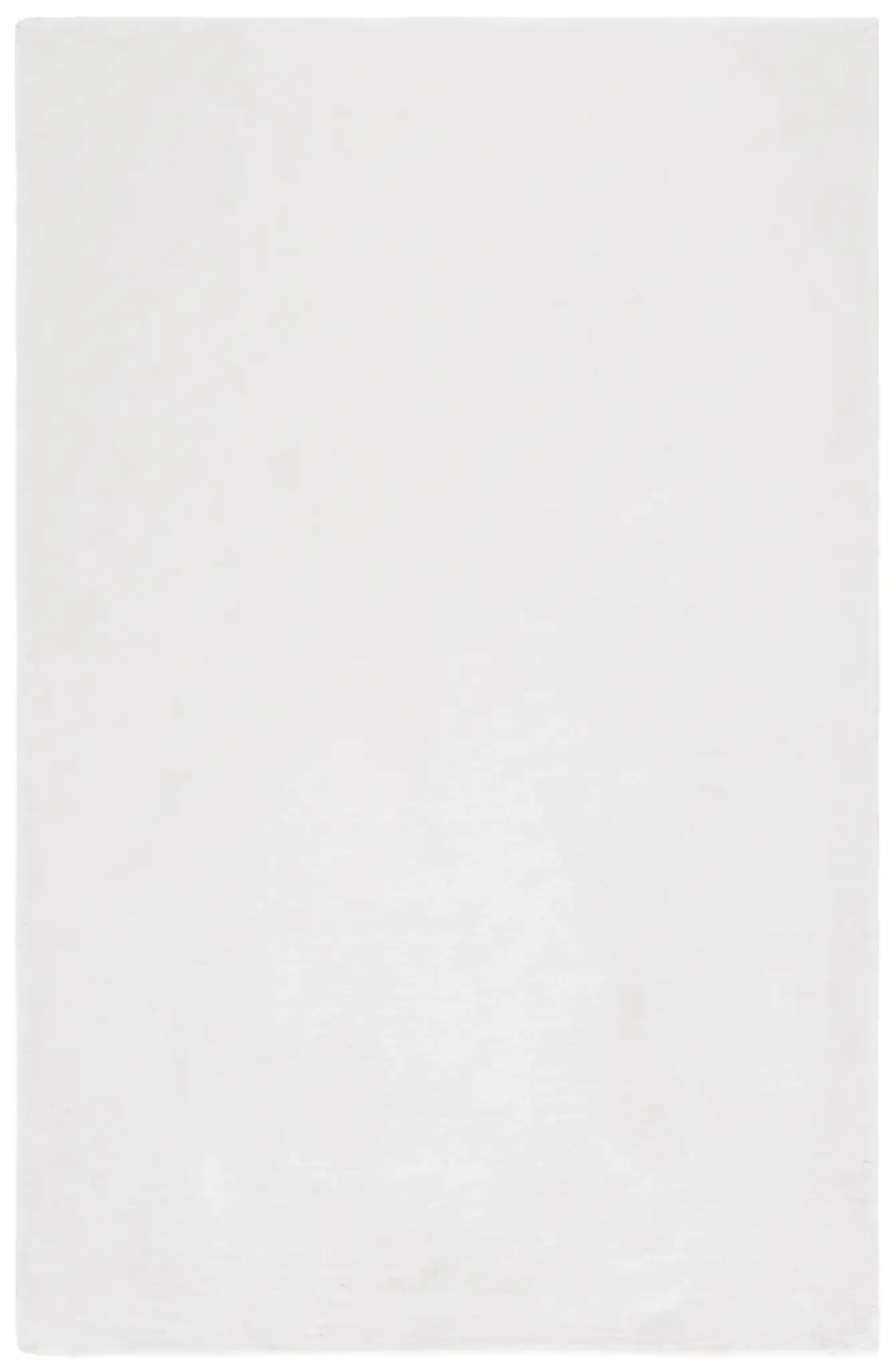Faux Fur Solid Washable Rug in Ivory