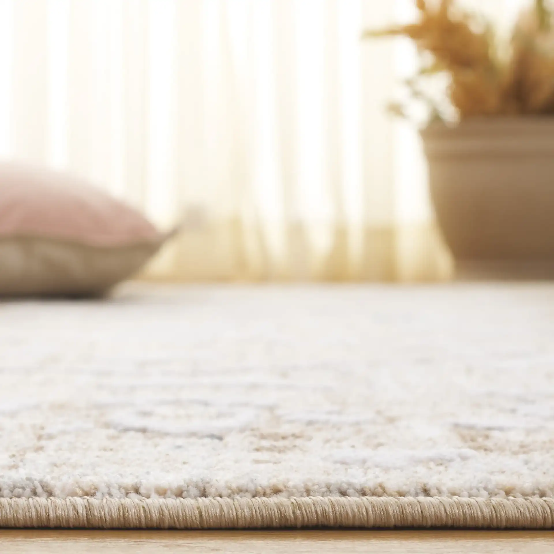Finley Allover Palmette Rug in Brown / Gray in a styled room