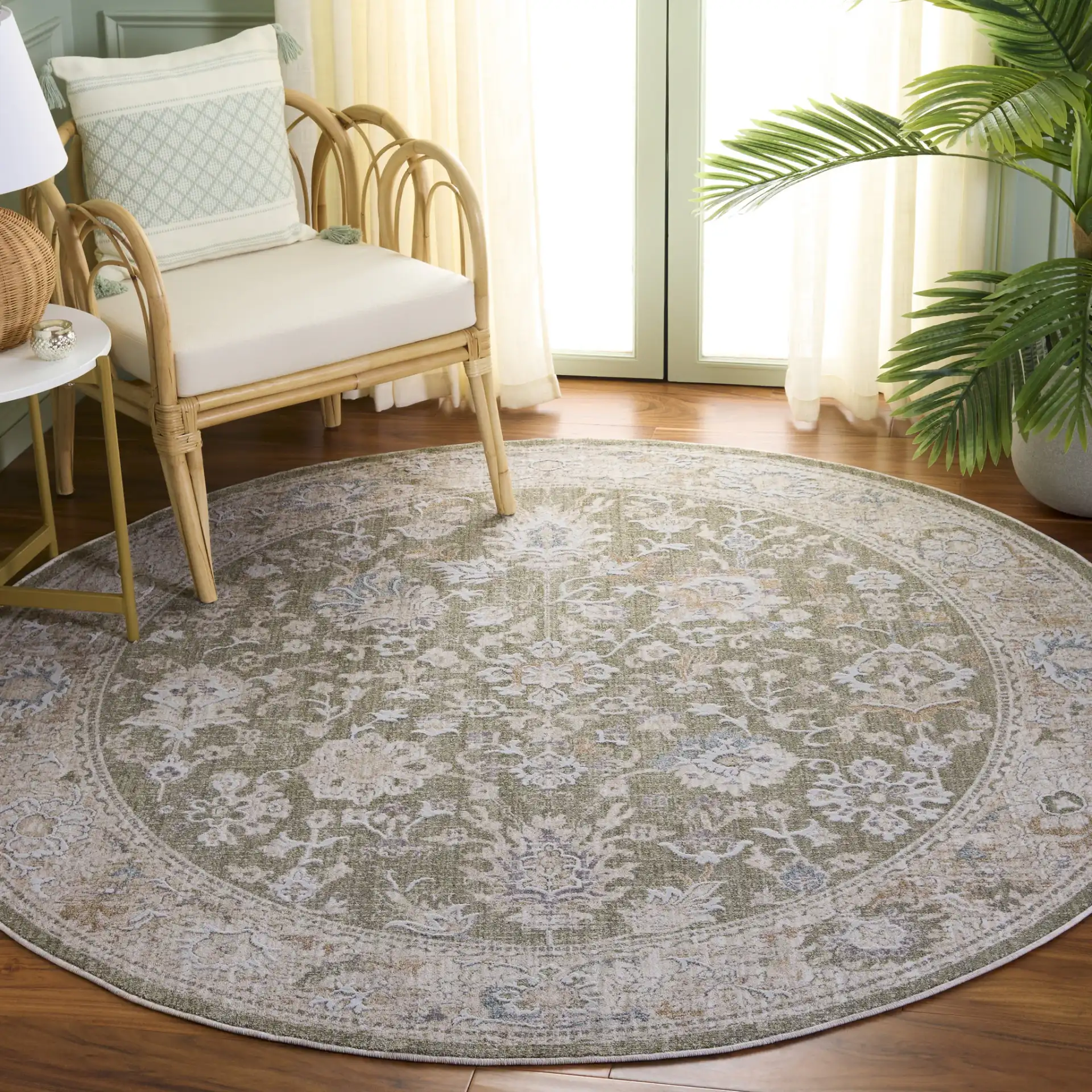 Finley Botanical Border Rug in Green / Beige in a styled room